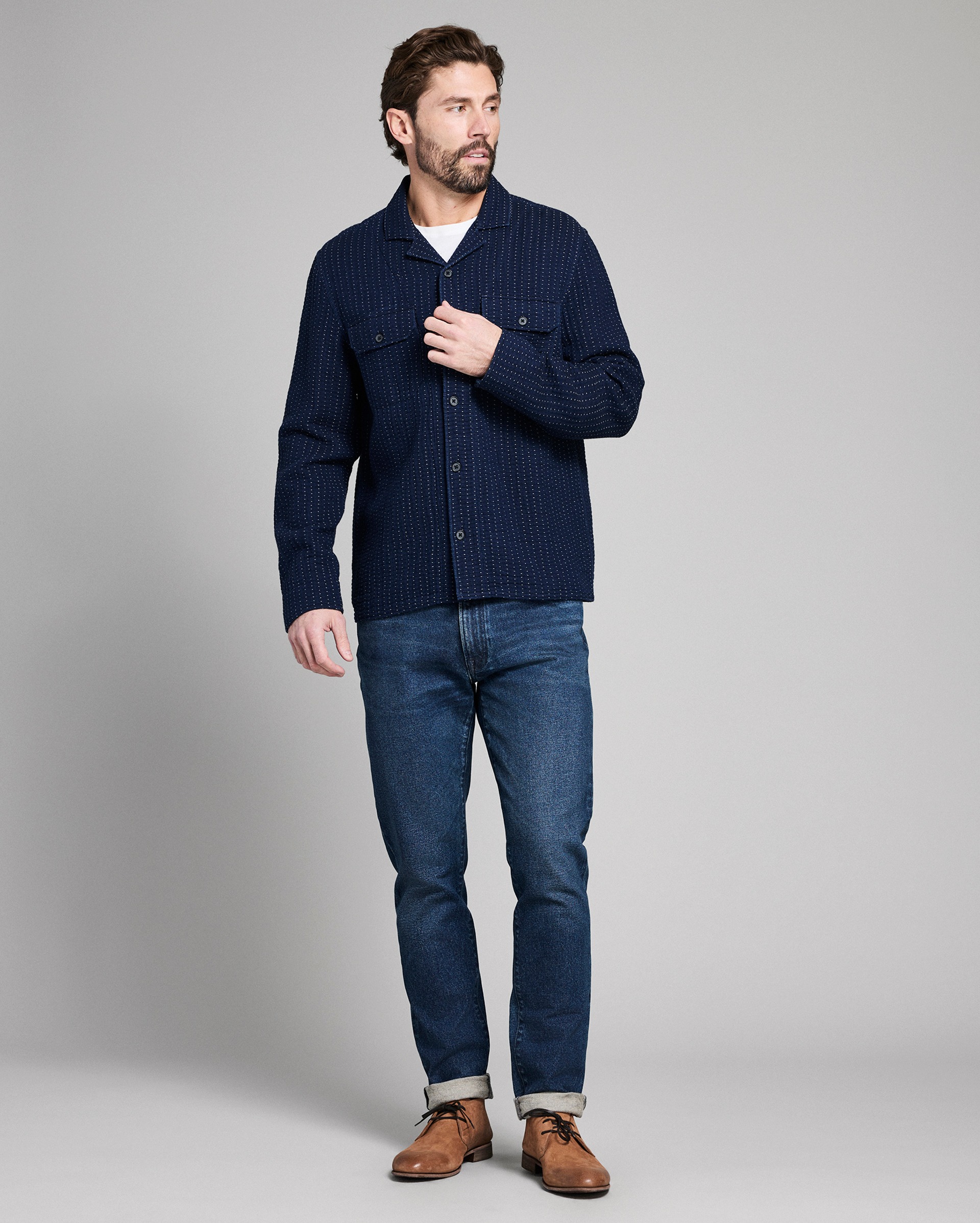 Model shows the fit of the shirt.