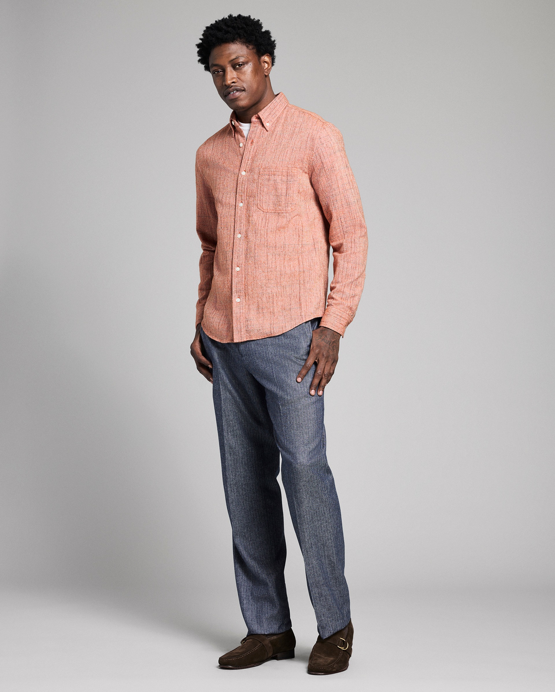 Model shows the fit of the shirt.