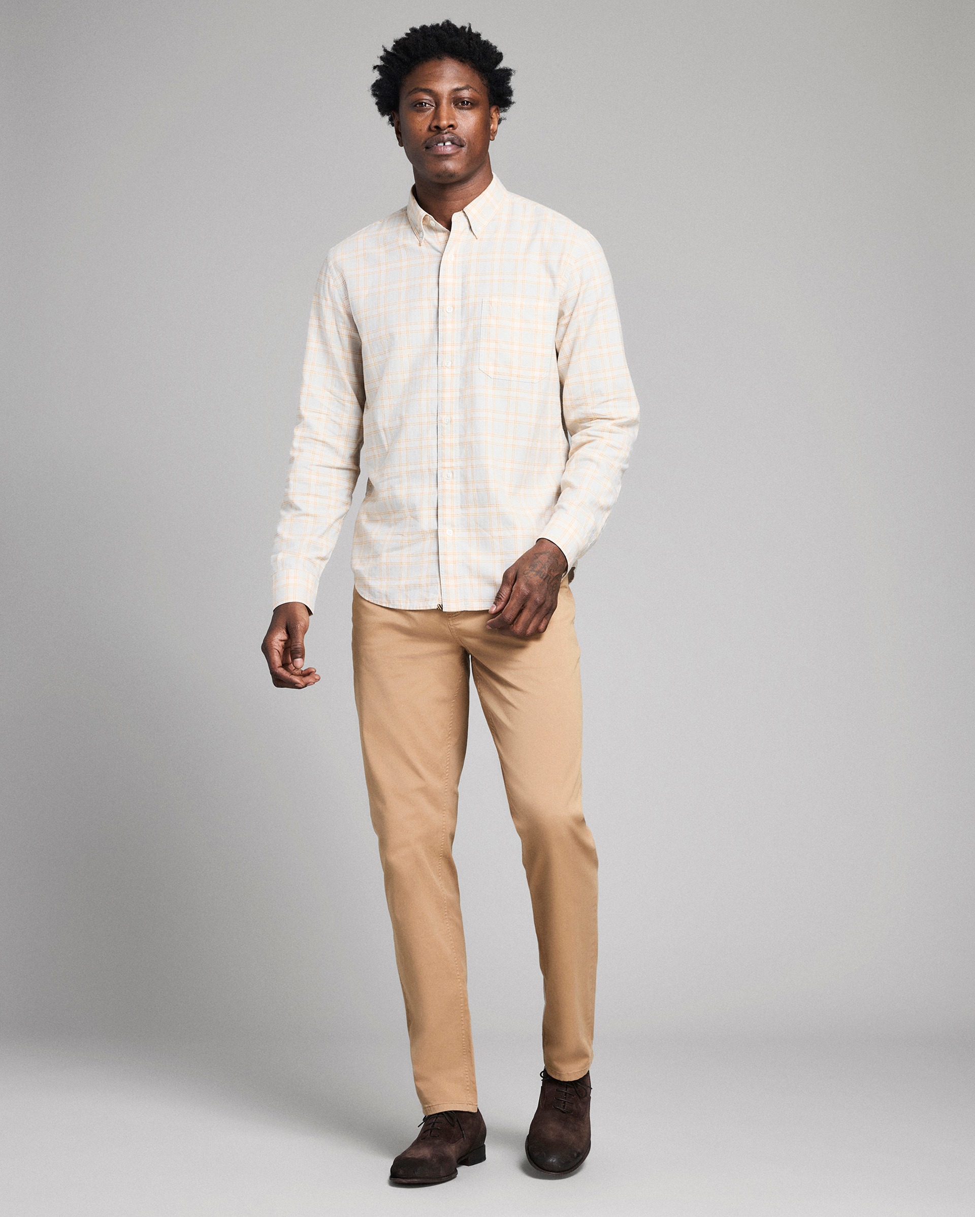 Model shows the fit of the shirt.