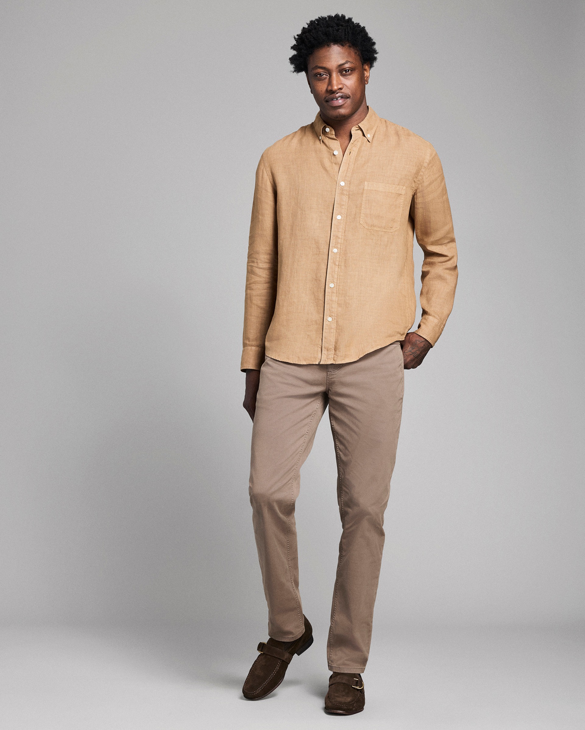 Model shows the fit of the shirt.