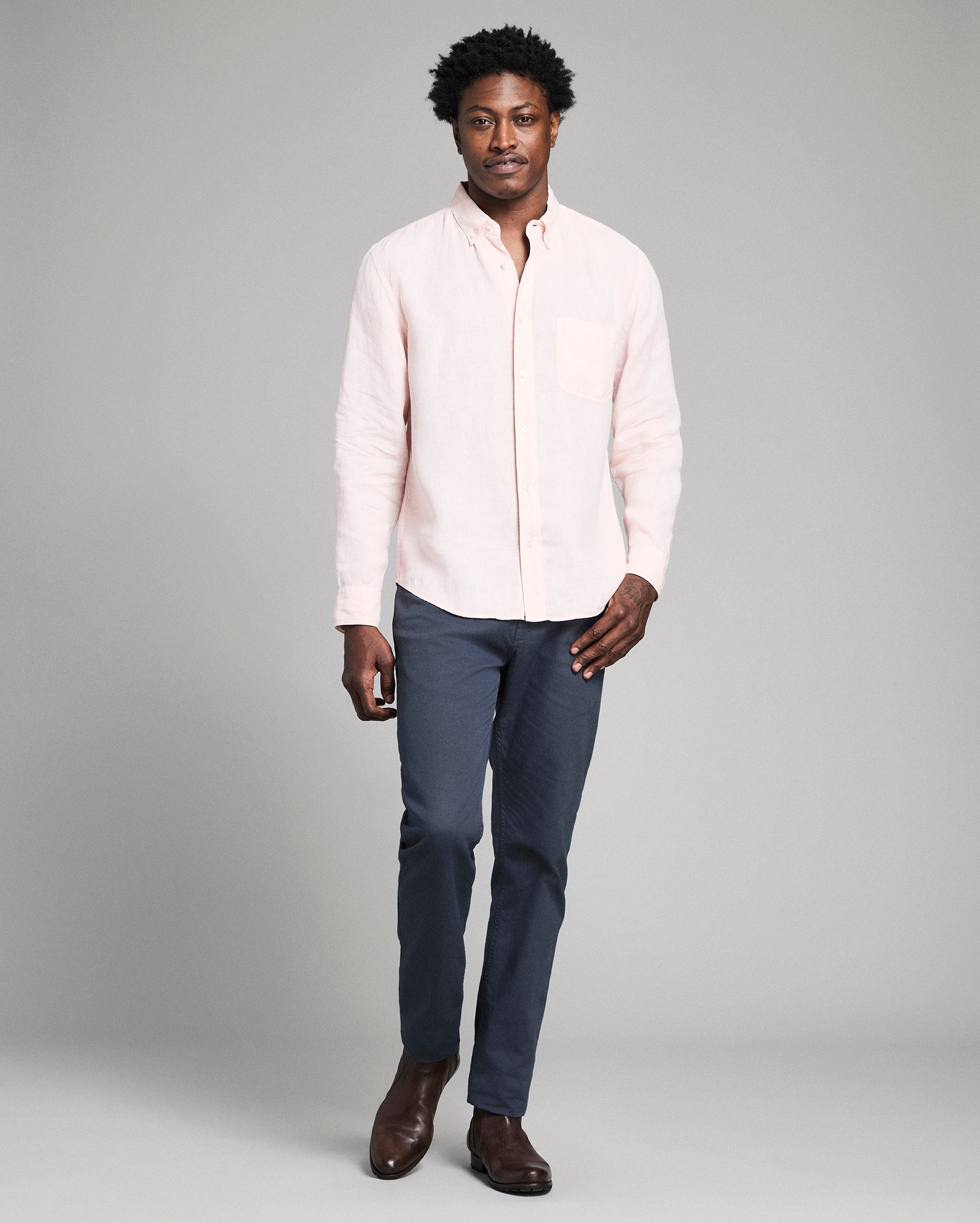 Model shows the fit of the shirt.