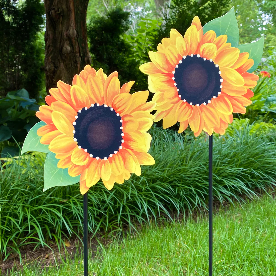 Sunflower magnets on the Magnetic Garden Stake in a garden