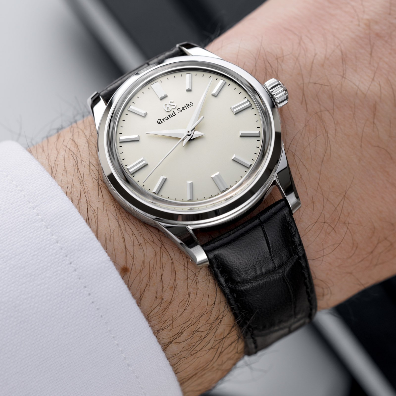 Grand Seiko ivory dial watch SBGW301 on wrist. 
