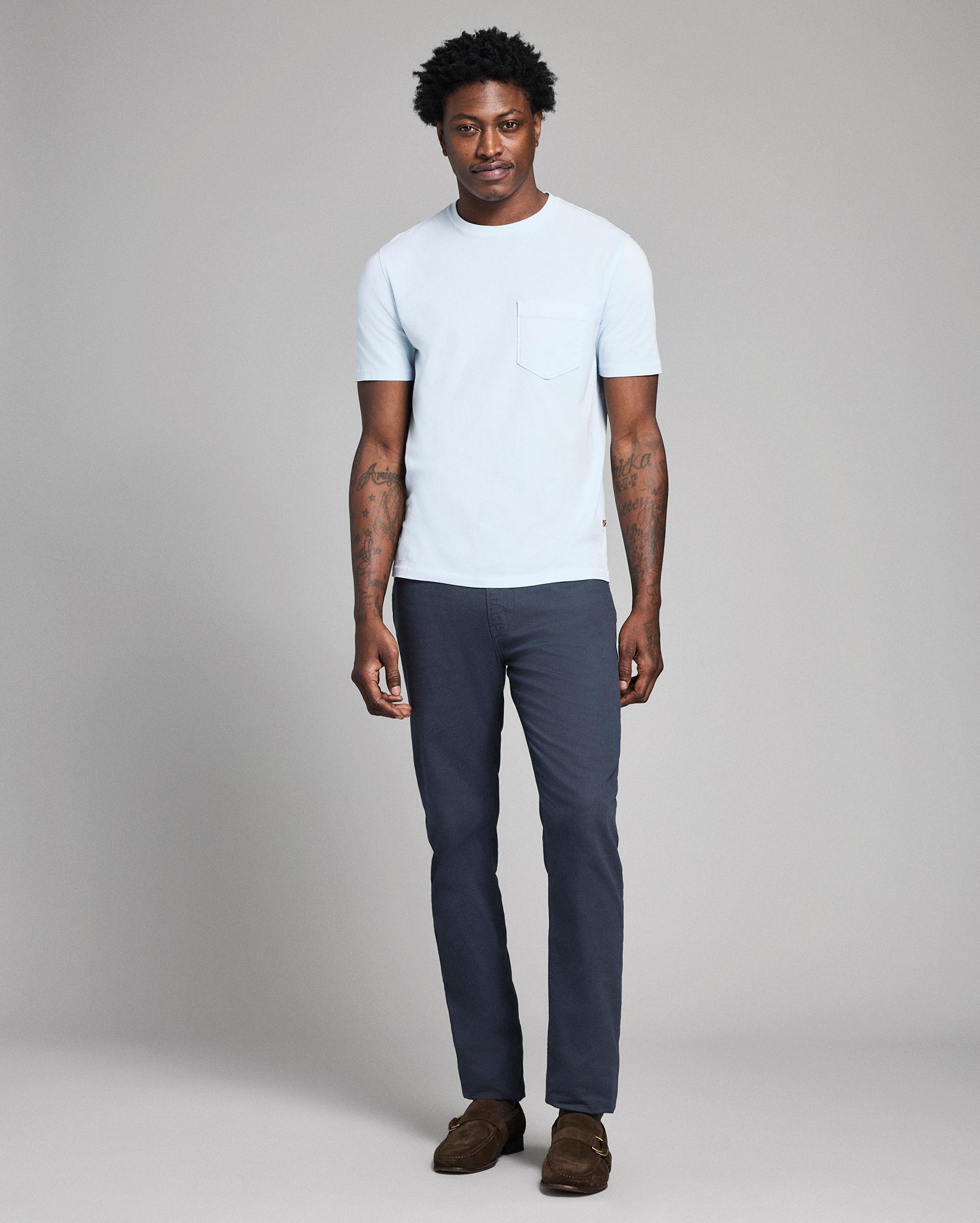 Model shows the fit of the shirt.