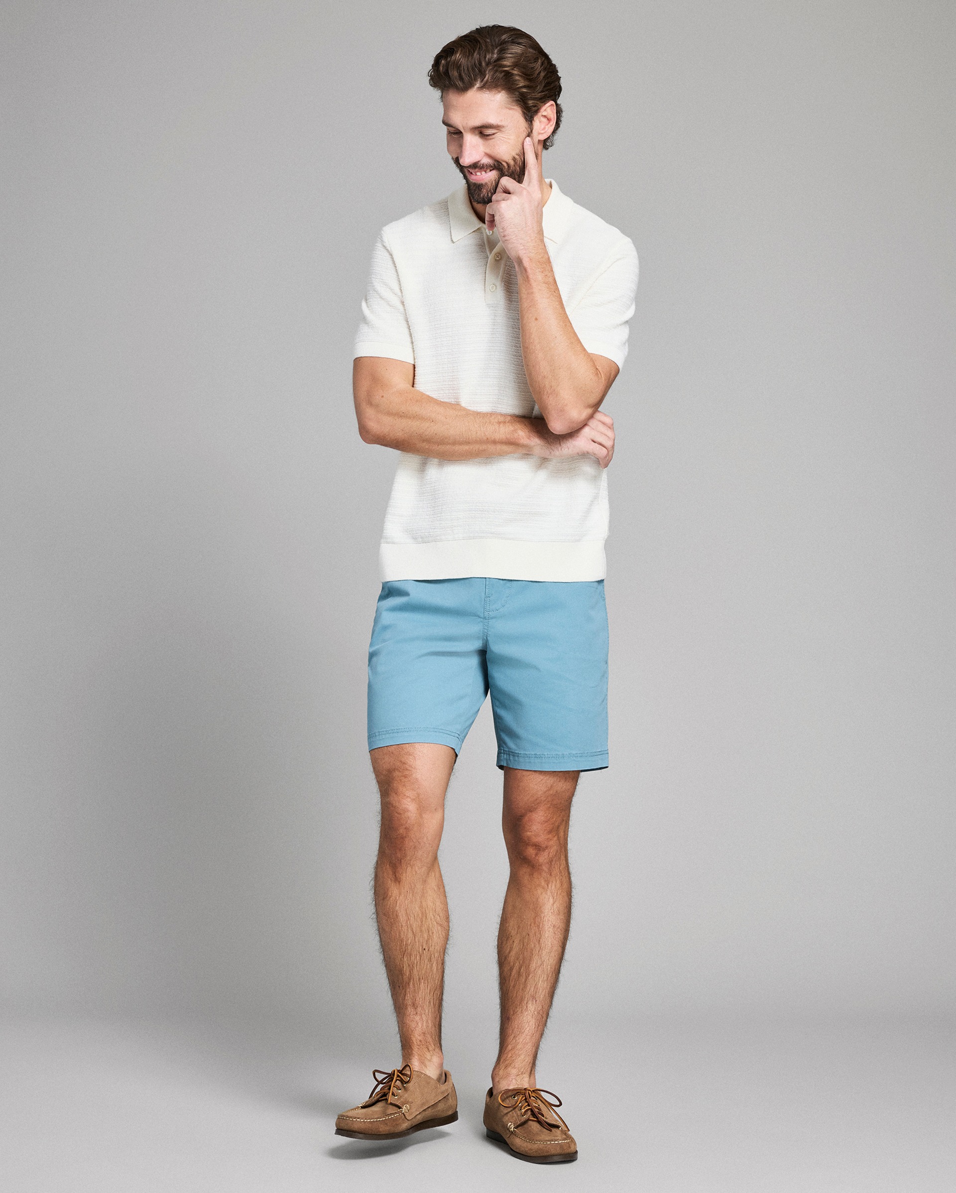 Model shows the fit of the shirts.