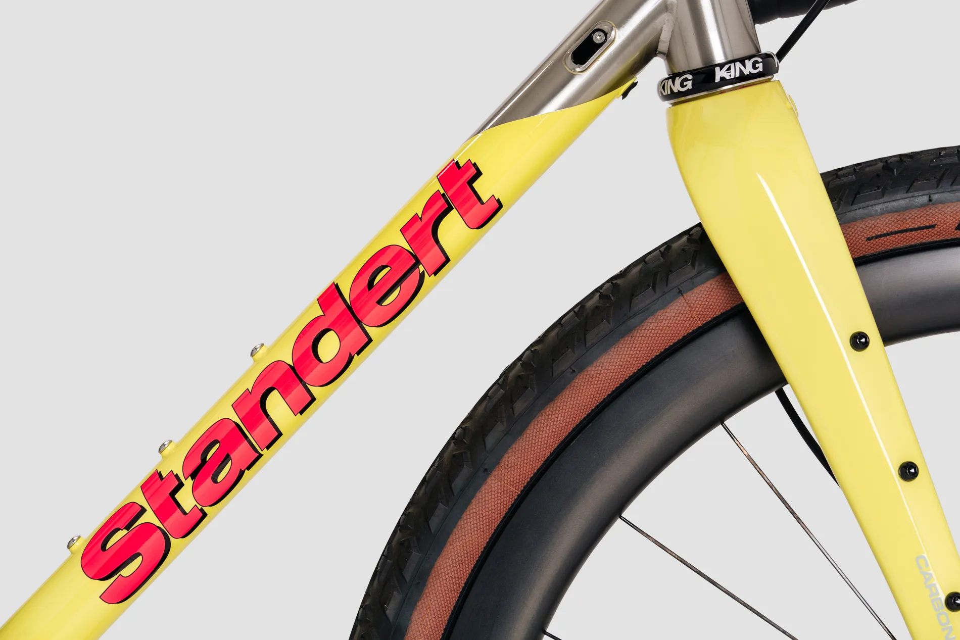 Downtube of Erdgeschoss gravel bike in yellow colour