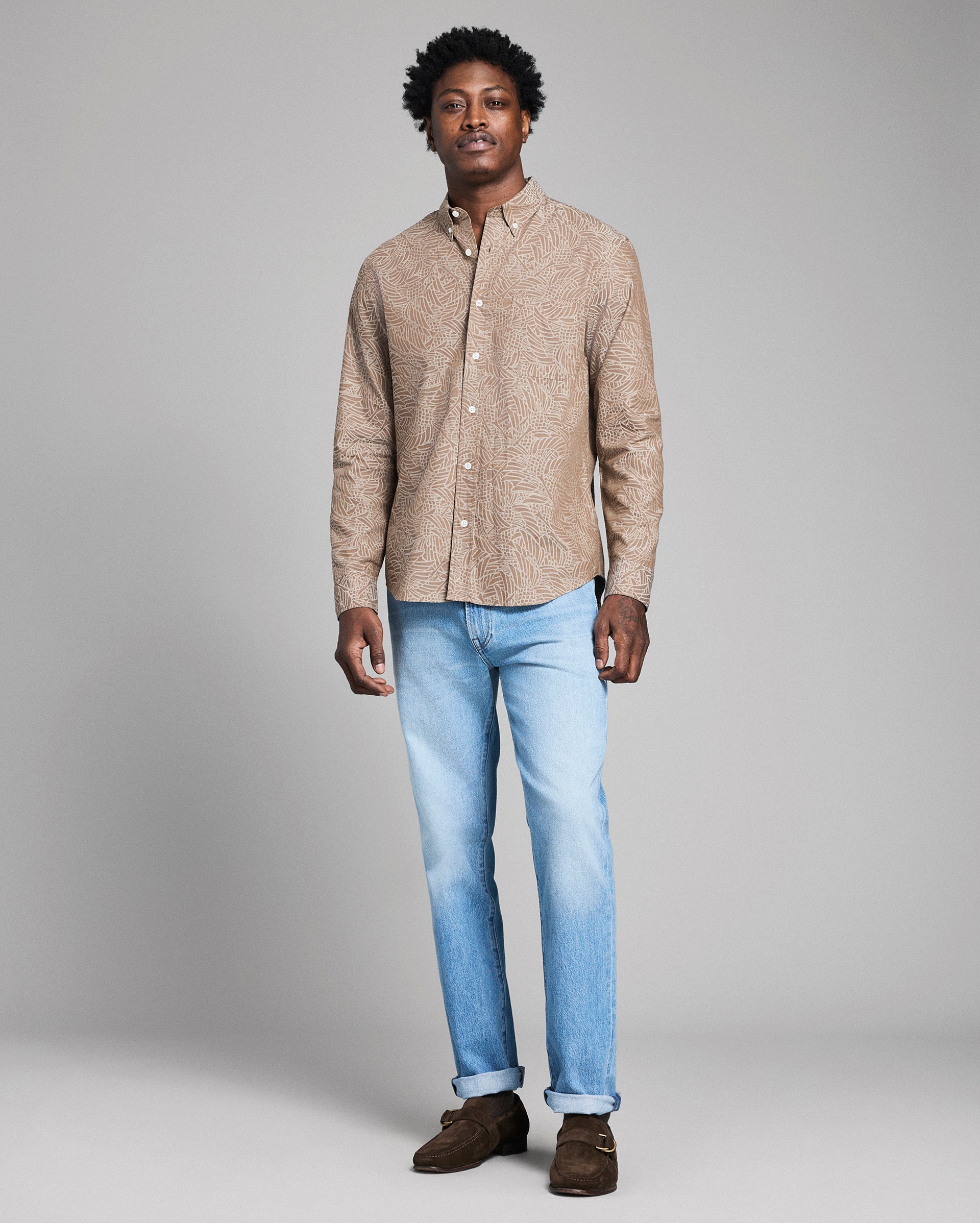 Model shows the fit of the shirt.