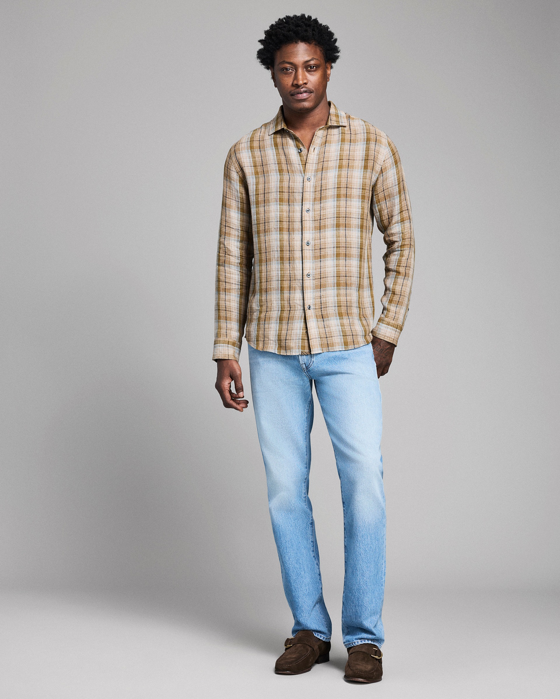 Model shows the fit of the shirt.