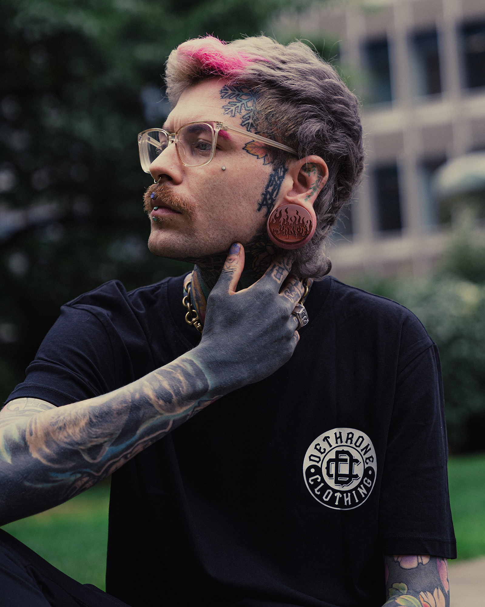 Alternative Tattooed man wearing  90's Retro Flames Plug / Gauge - Saba Wood | Flat Faced Double Flare