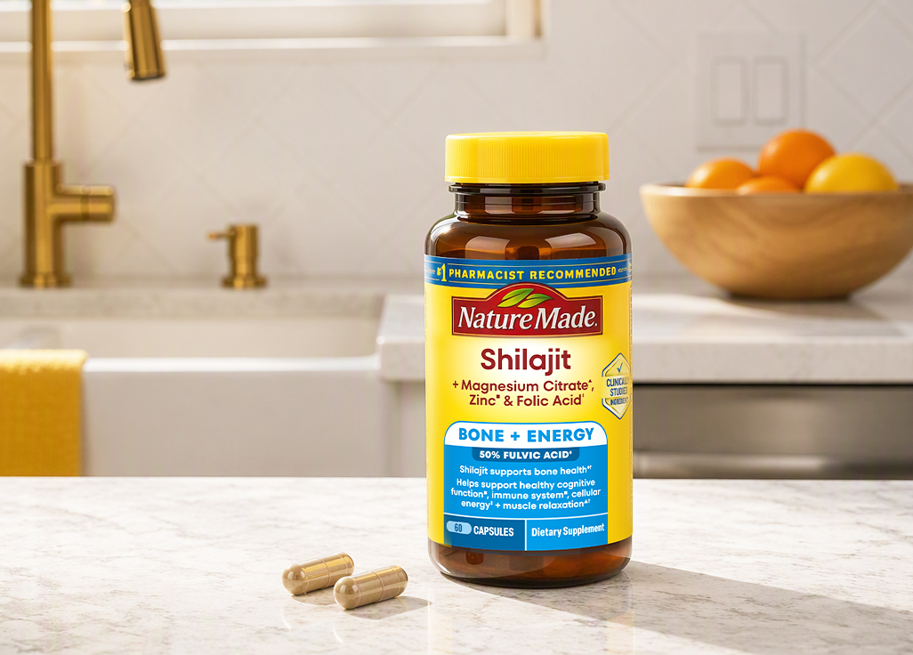 Nature Made Shilajit + Magnesium Citrate, Zinc & Folic Acid Capsules bottle shown in a kitchen setting. 