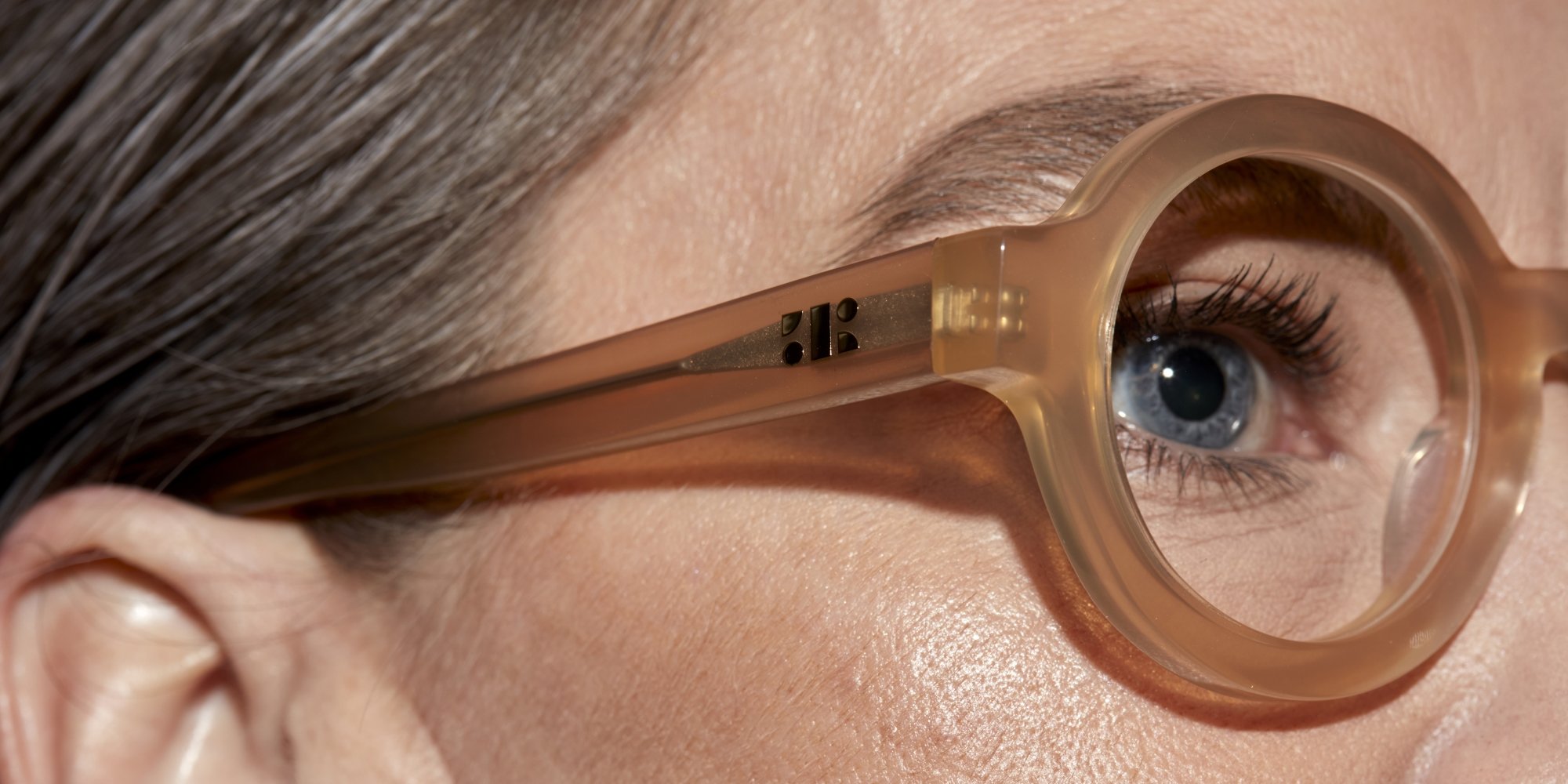 Photo Details of Lola Nude Reading Glasses in a room