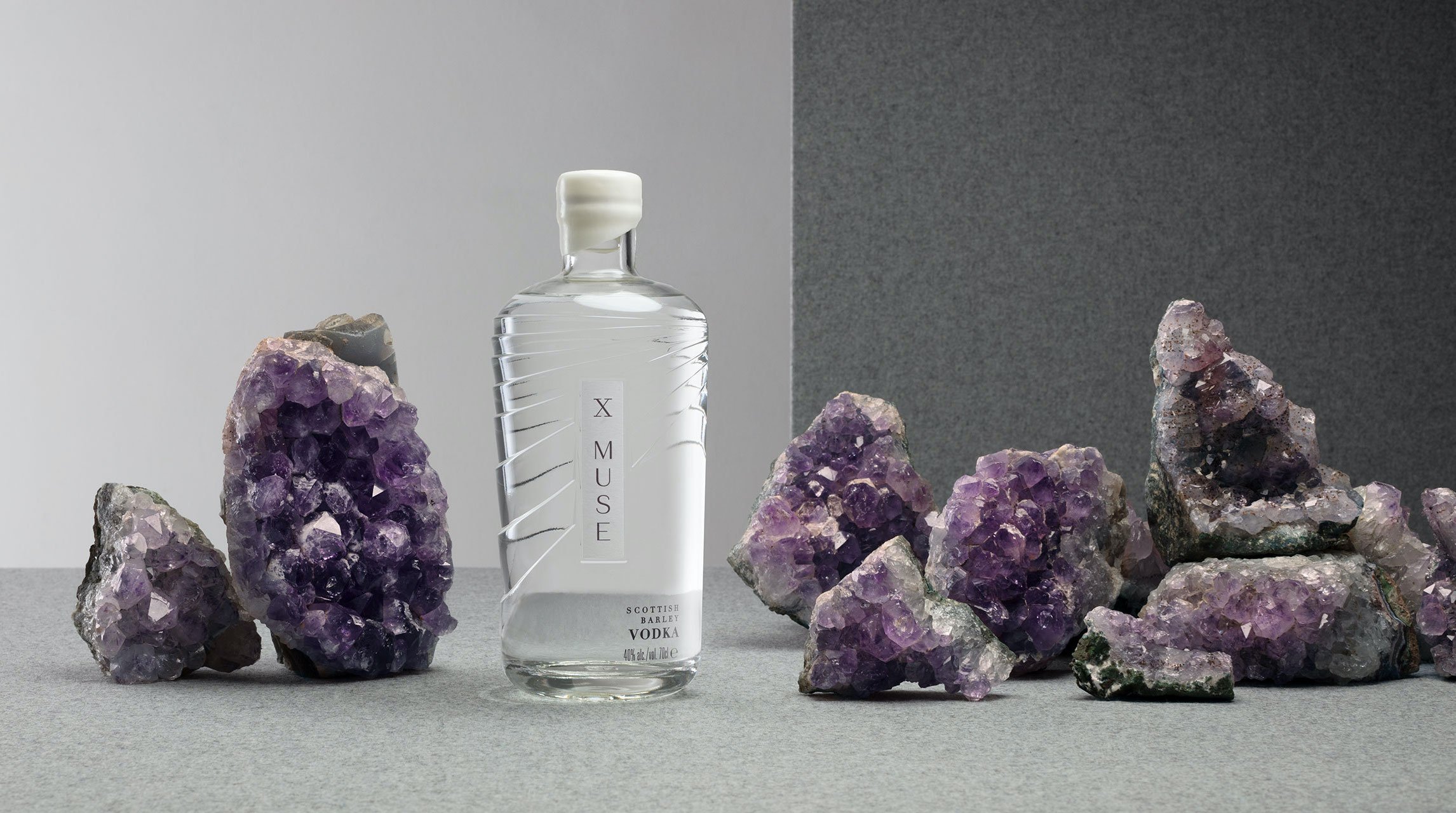 X Muse vodka alongside some crystals