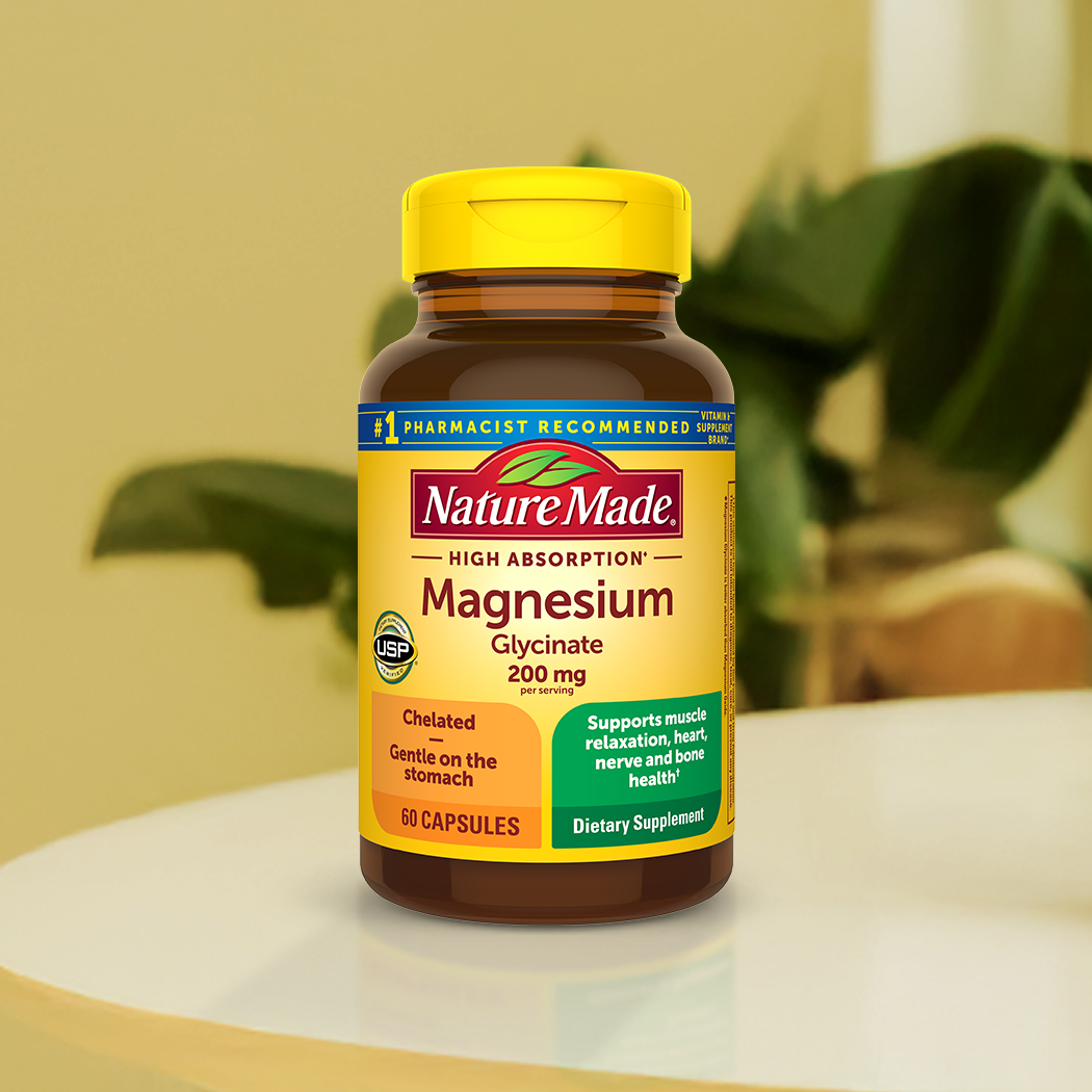 Nature Made Magnesium bottle on a wooden table.