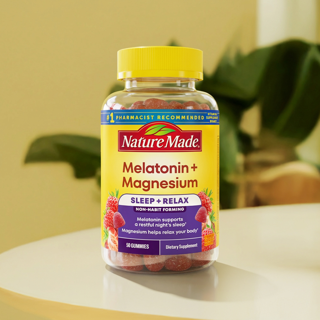 Nature Made Melatonin + Magnesium gummies displayed on countertop.