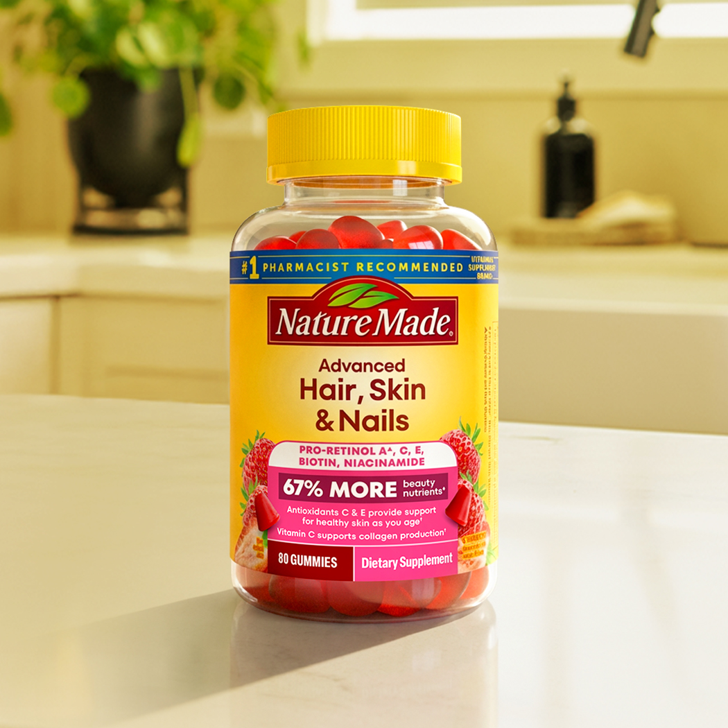 Nature Made Advanced Hair, Skin & Nails gummy vitamins on kitchen counter.