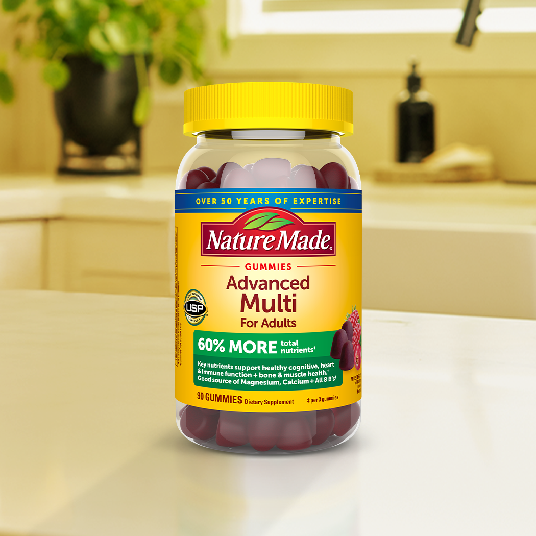 Nature Made Advanced Multi Gummies on a kitchen counter.