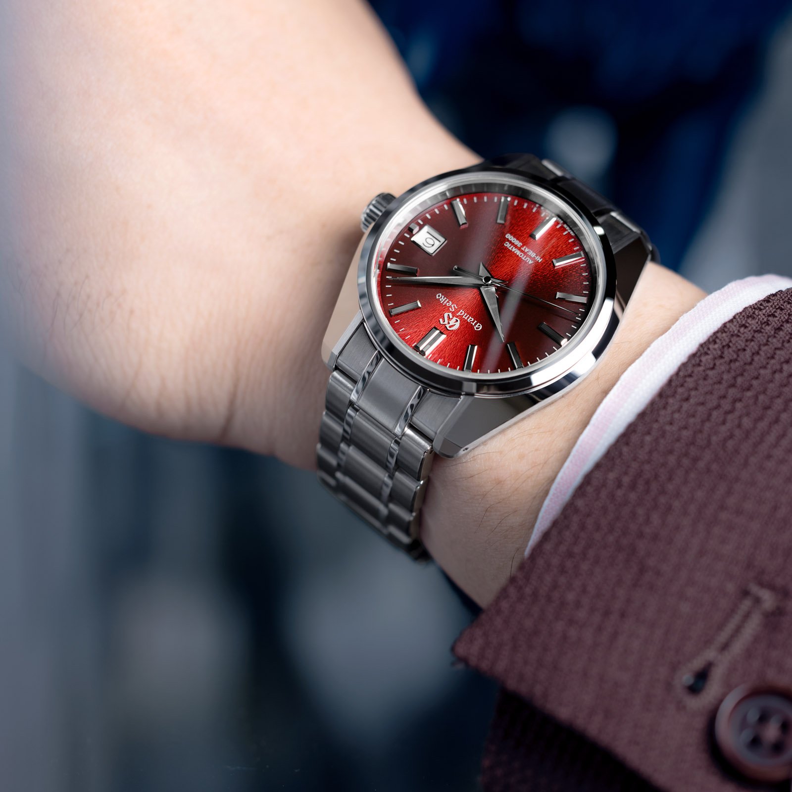 Grand Seiko SBGH345 red-dial 44GS watch in Ever-Brilliant Steel. 