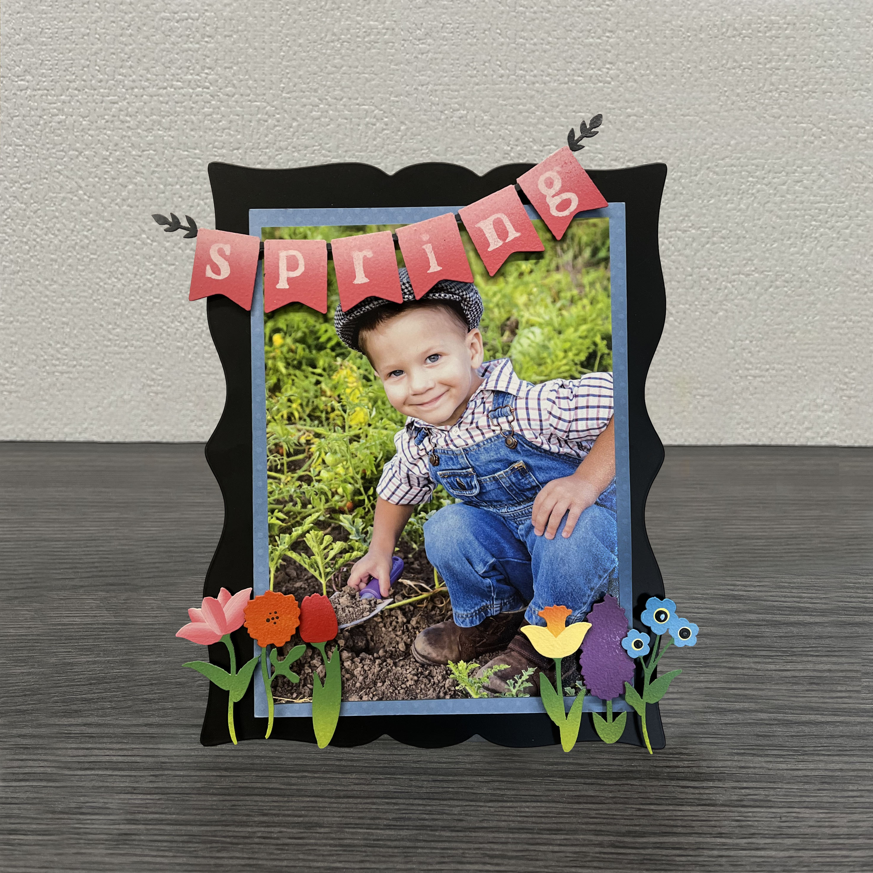 Black easel with decorative magnets. 