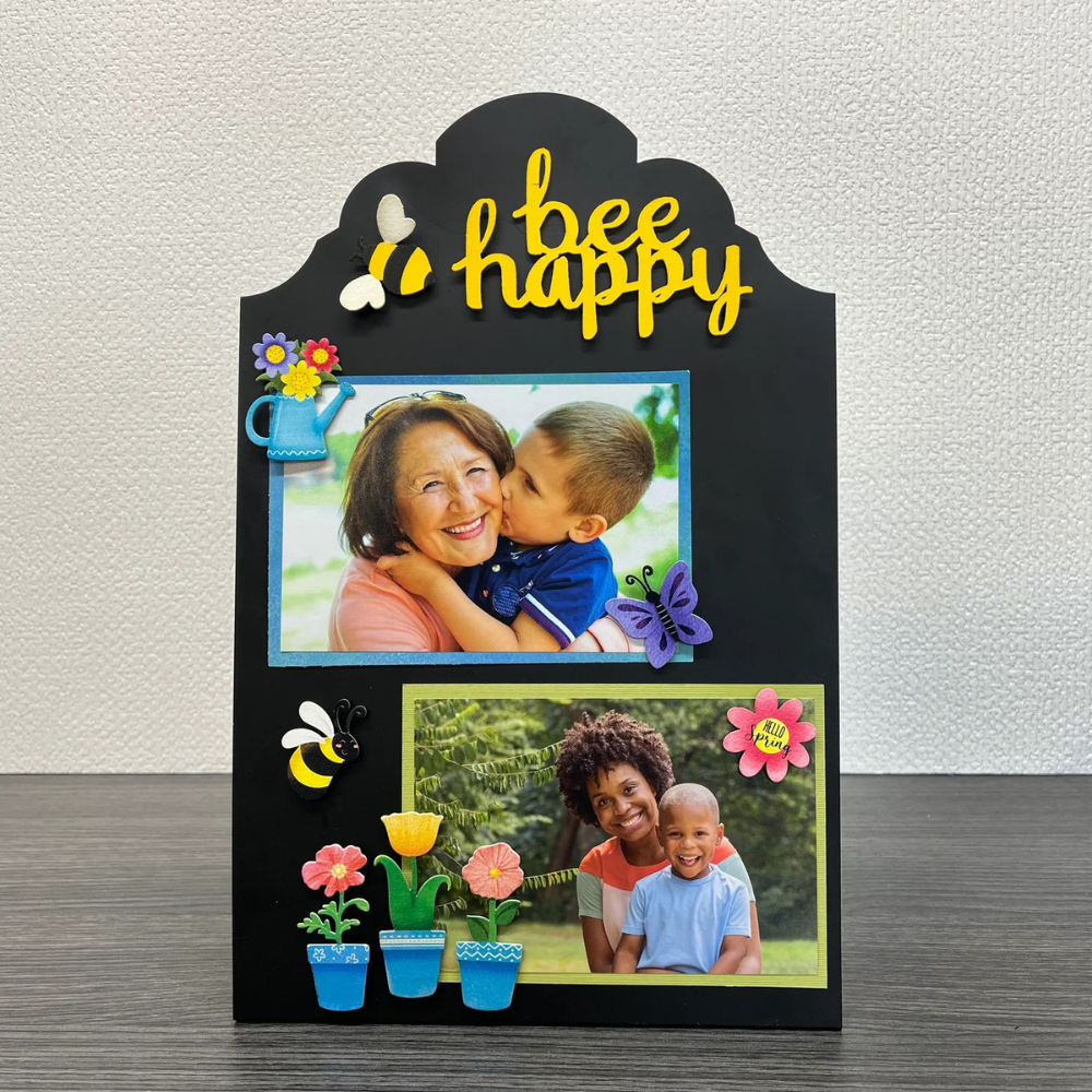 Hello spring magnets and spring magnets on a black easel with photos. 