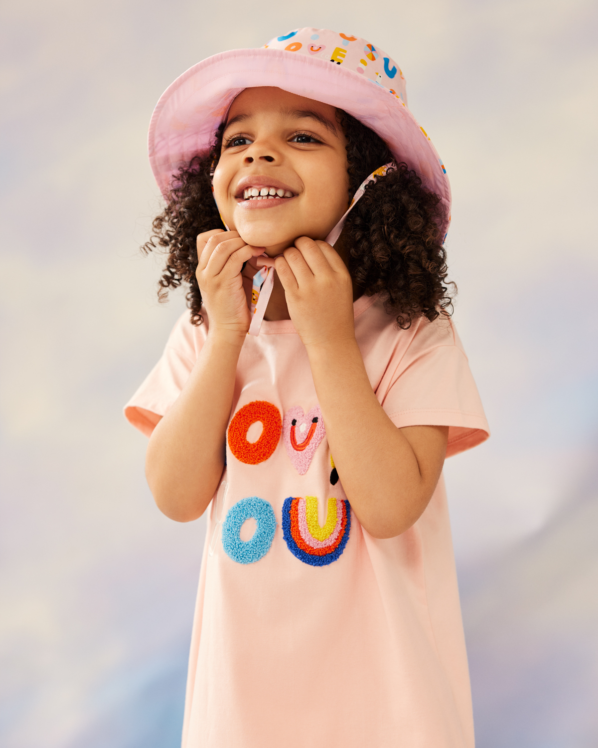 2021, Girls Boucle dress and Sun Hat.