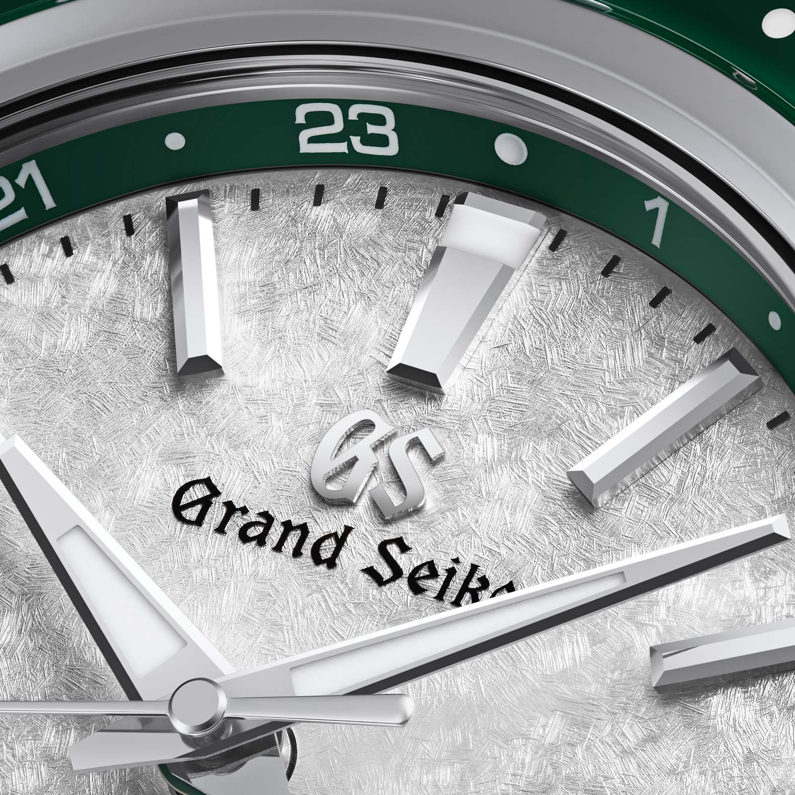 Grand Seiko Hi-Beat GMT watch with white dial and green accents