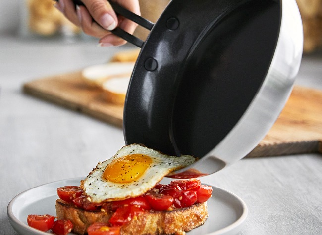 Stanley Tucci™ Stainless Steel Ceramic Nonstick 6.5-Quart Essential Stanley Pan with Lid | Champagne Handle info card