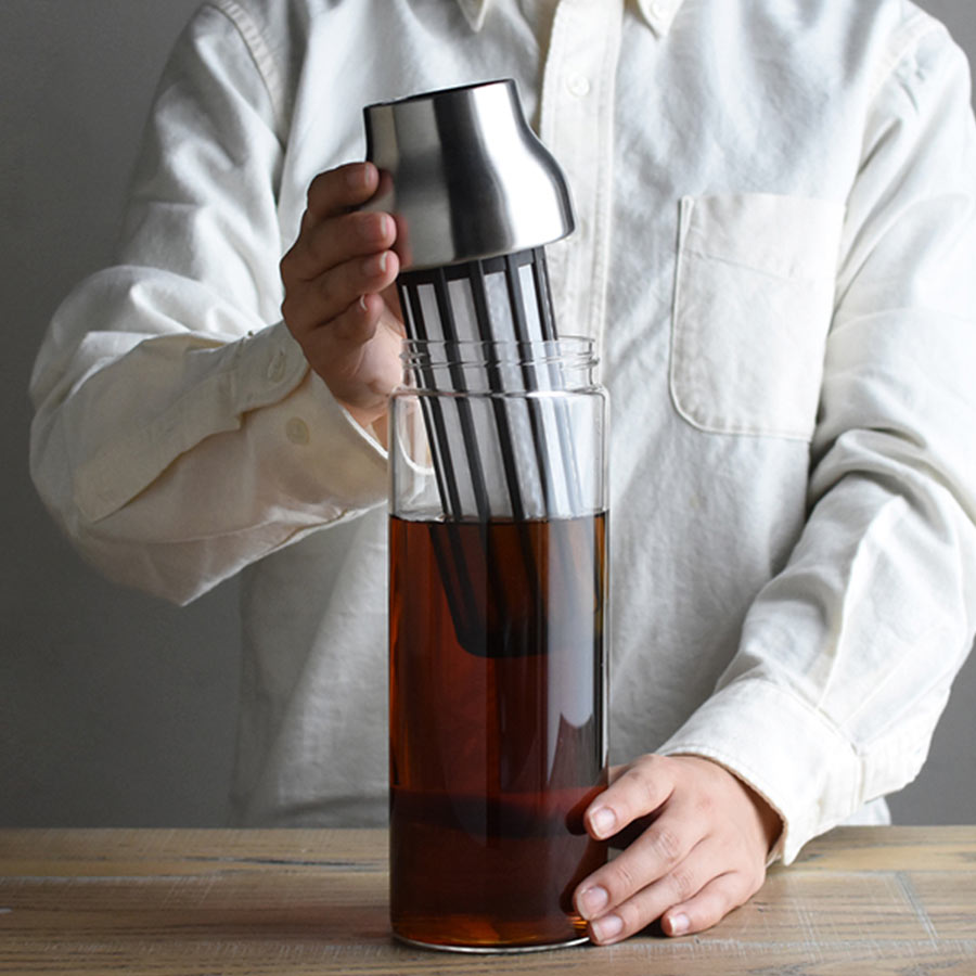  CAPSULE cold brew carafe with filter insert being removed  