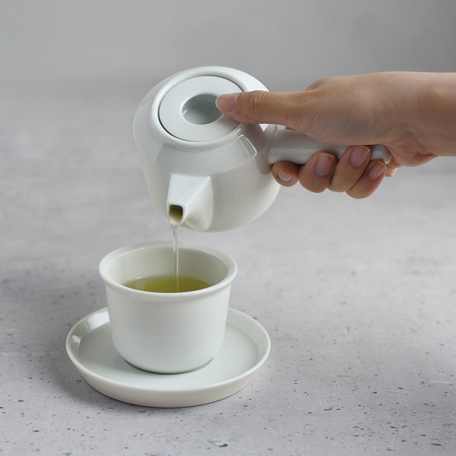  Pouring tea into LT cup and saucer with LT kyusu teapot  