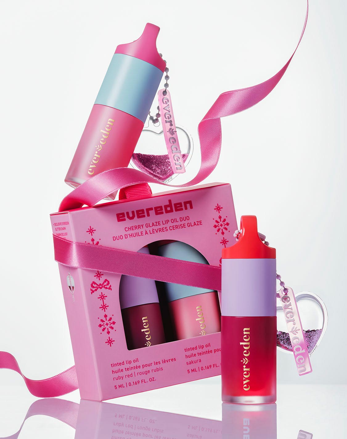 Kids Cherry Glaze Lip Oil Duo Gift Set spread to highlight its texture