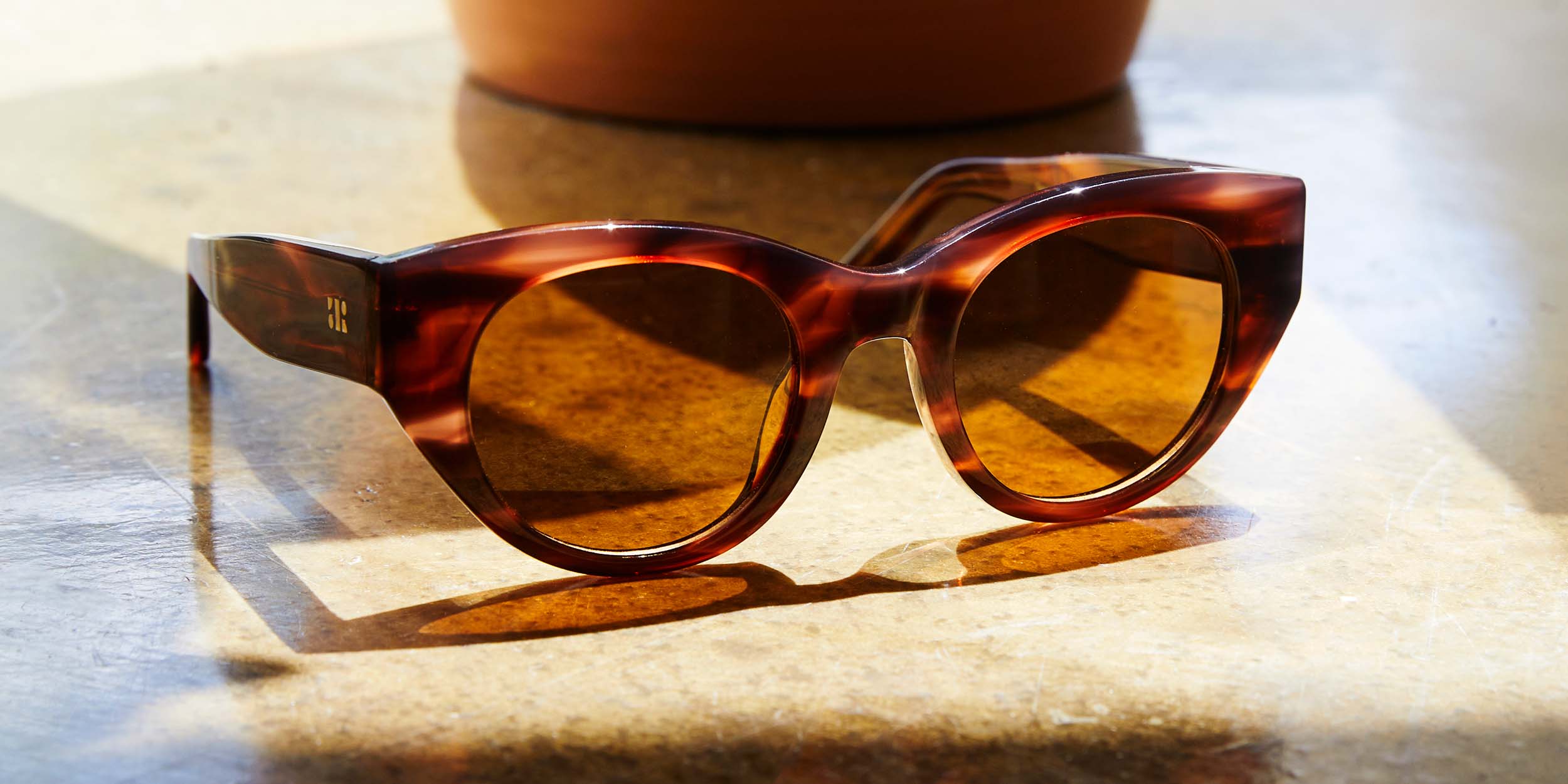 Photo Details of Jackie Sand Reading Glasses in a room