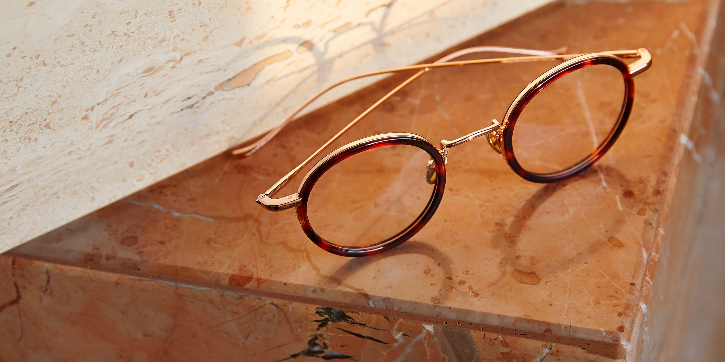 Photo Details of Nicolas Blue Light Army Green & Gold Blue Light Glasses in a room