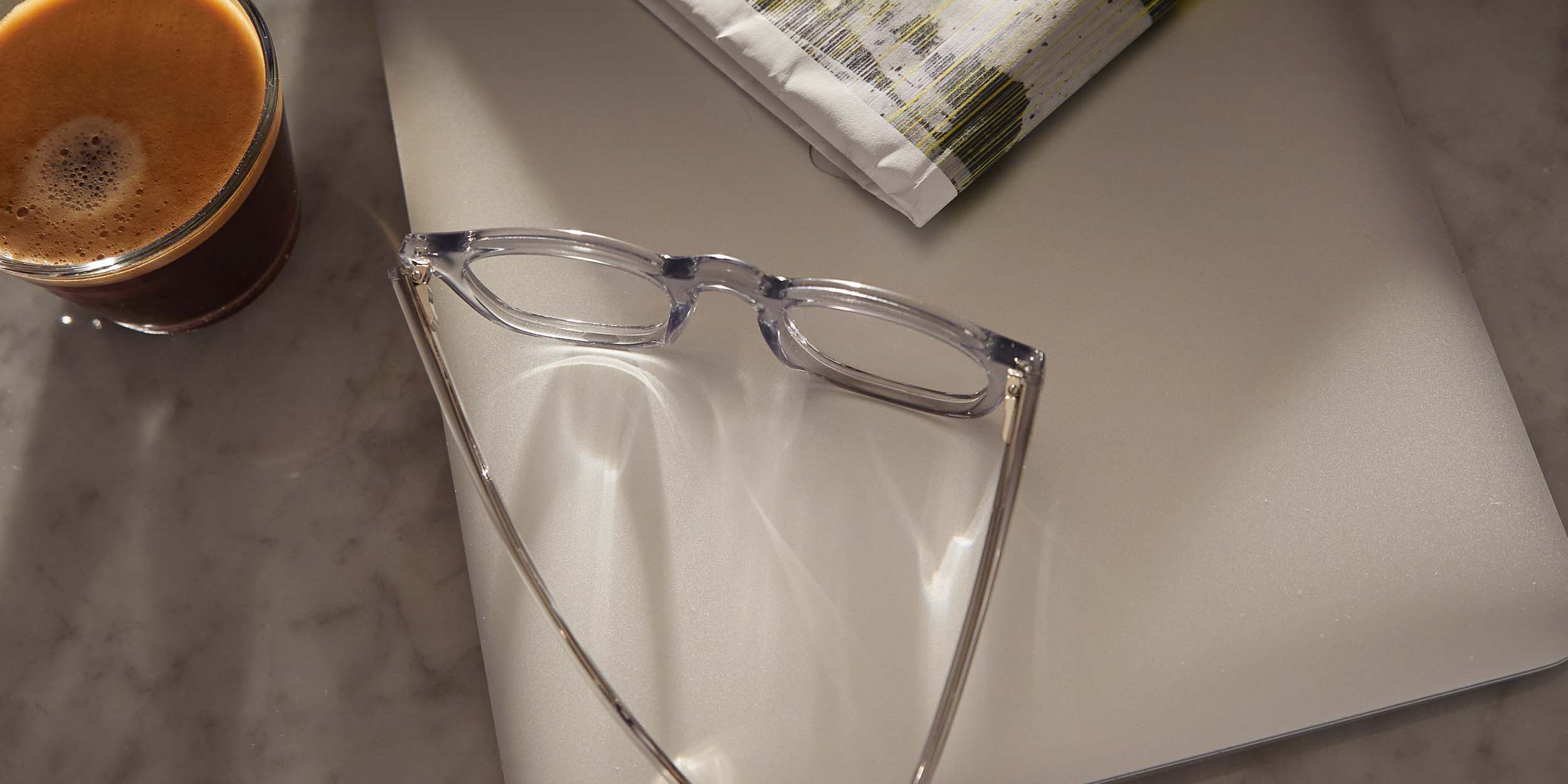 Photo Details of Thomas Blue Light Yellow Tortoise Blue Light Glasses in a room