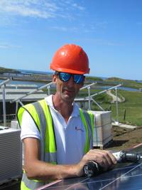 Gordon from SolarKinetics helping Wind & Sun on the Isle of Canna