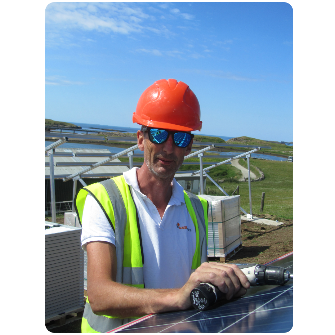 Gordon from Solar Kinetic helping the Wind & Sun Team with an island installation