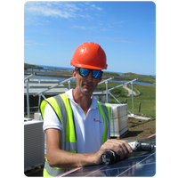Gordon from Solar Kinetic helping the Wind & Sun Team with an island installation