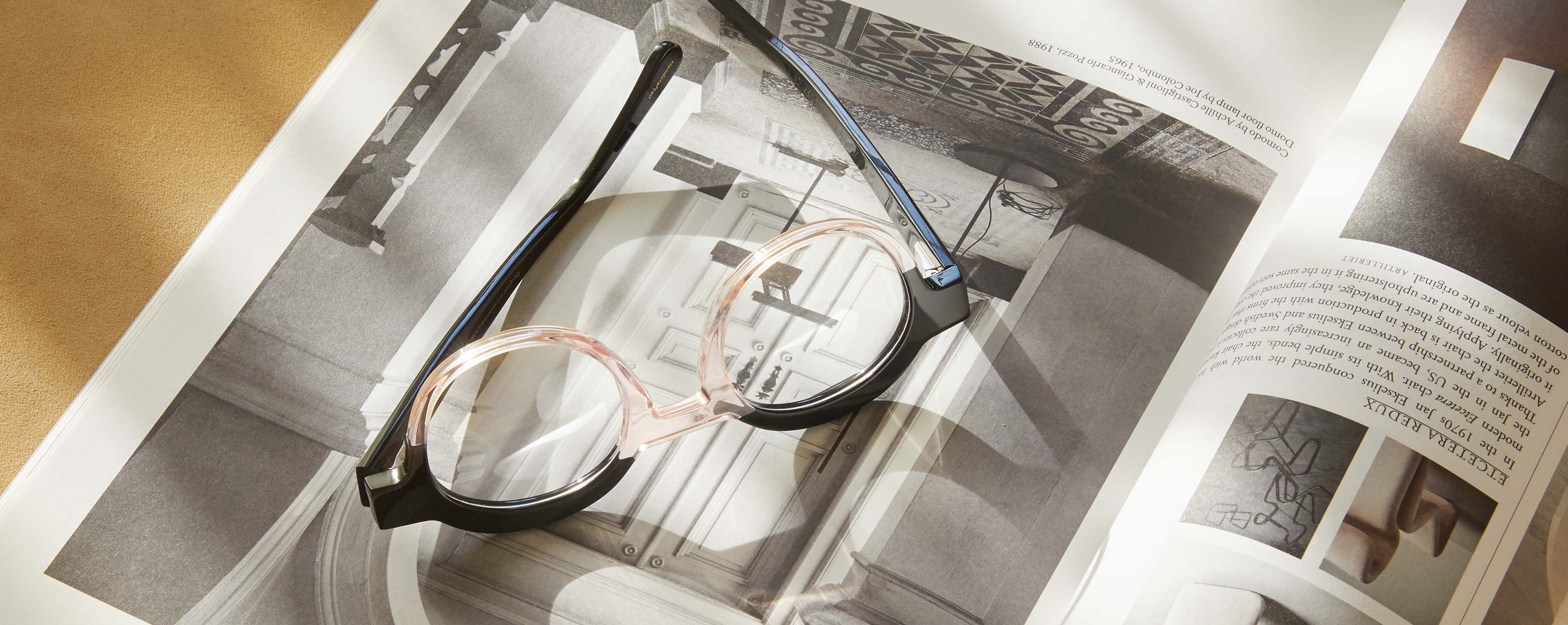 Photo Details of Charlotte Clear Mauve & Tortoise Reading Glasses in a room