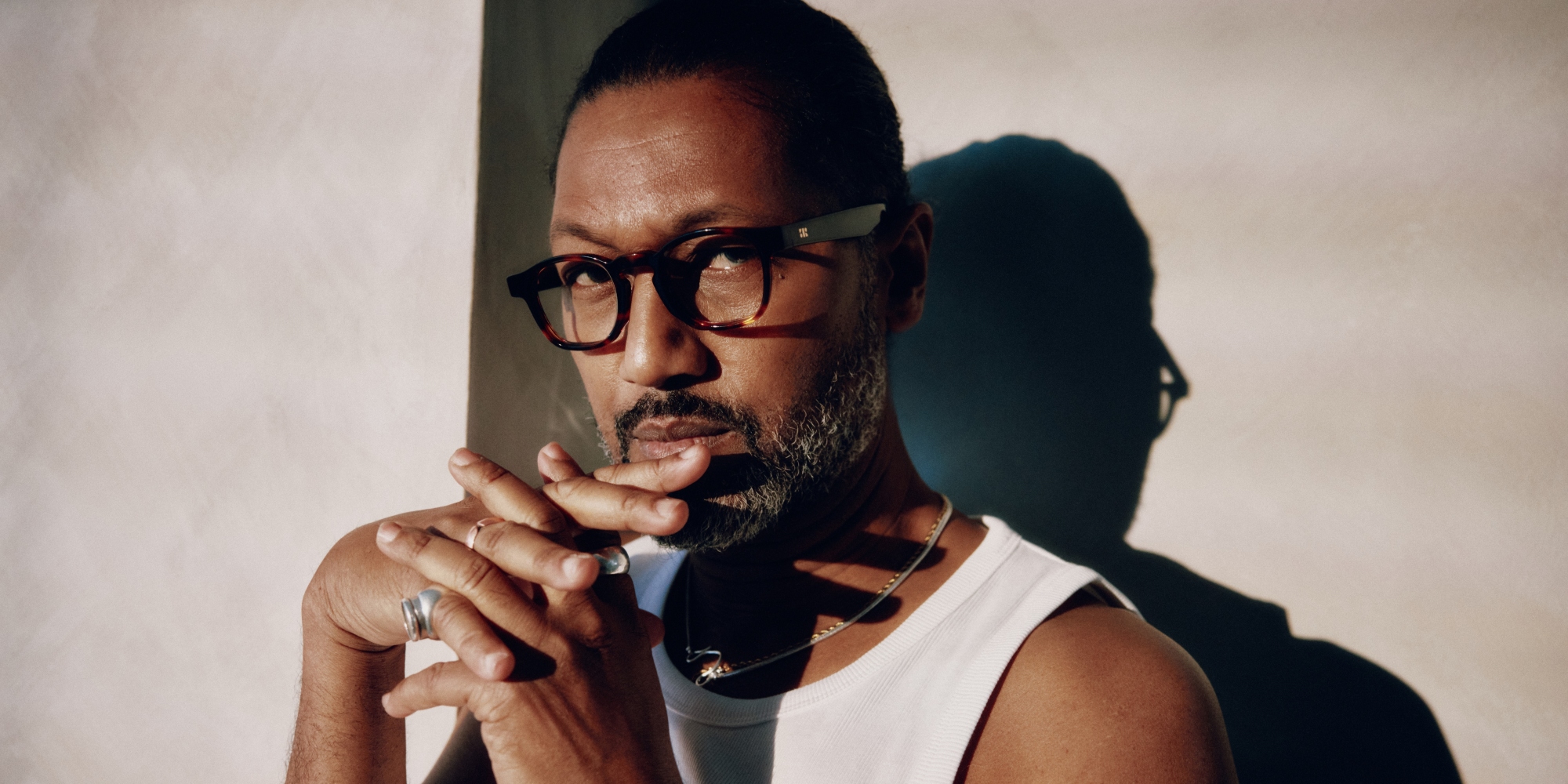 Photo Details of Enzo Blue Light Dark Red Blue Light Glasses in a room