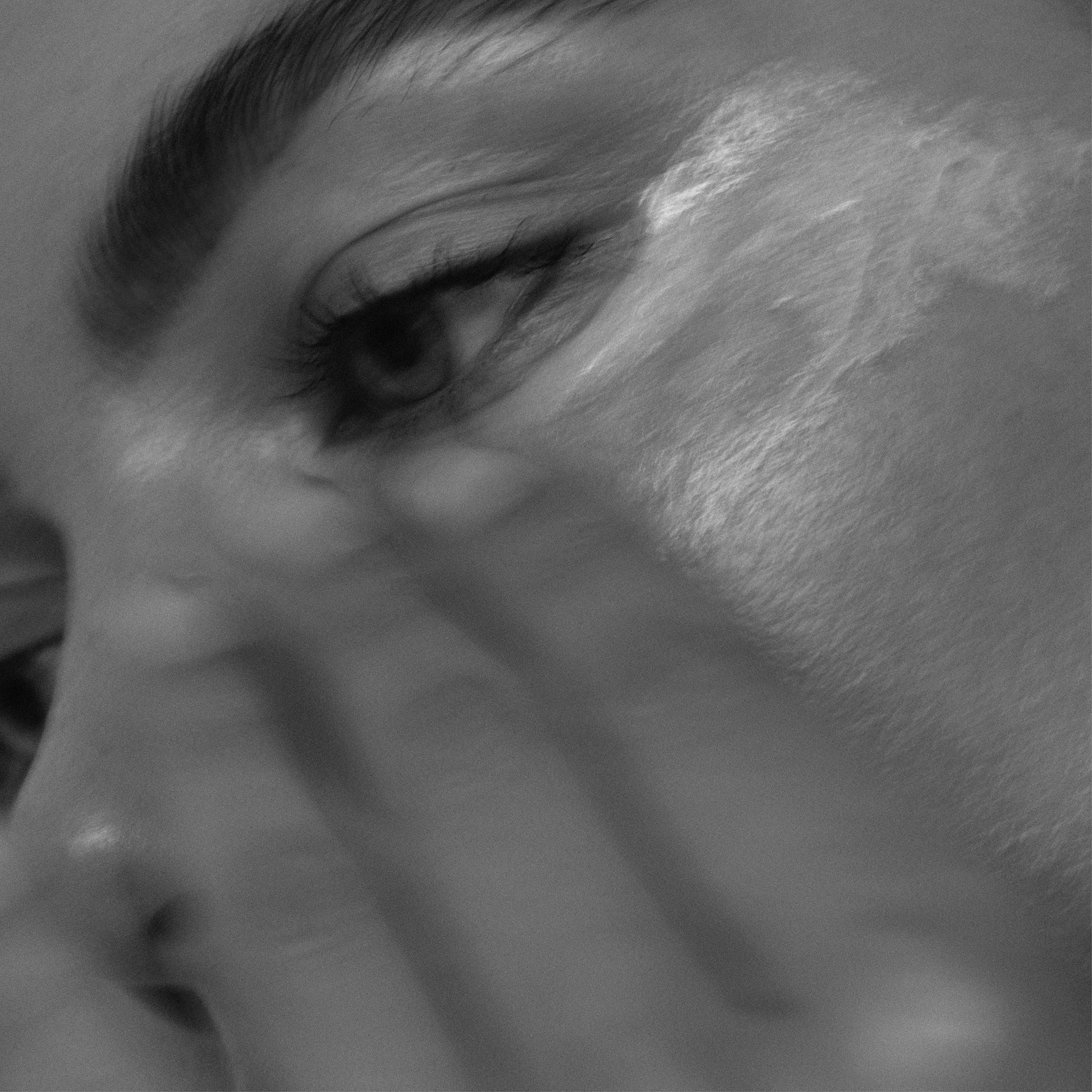 Person applying eye product to under eye area