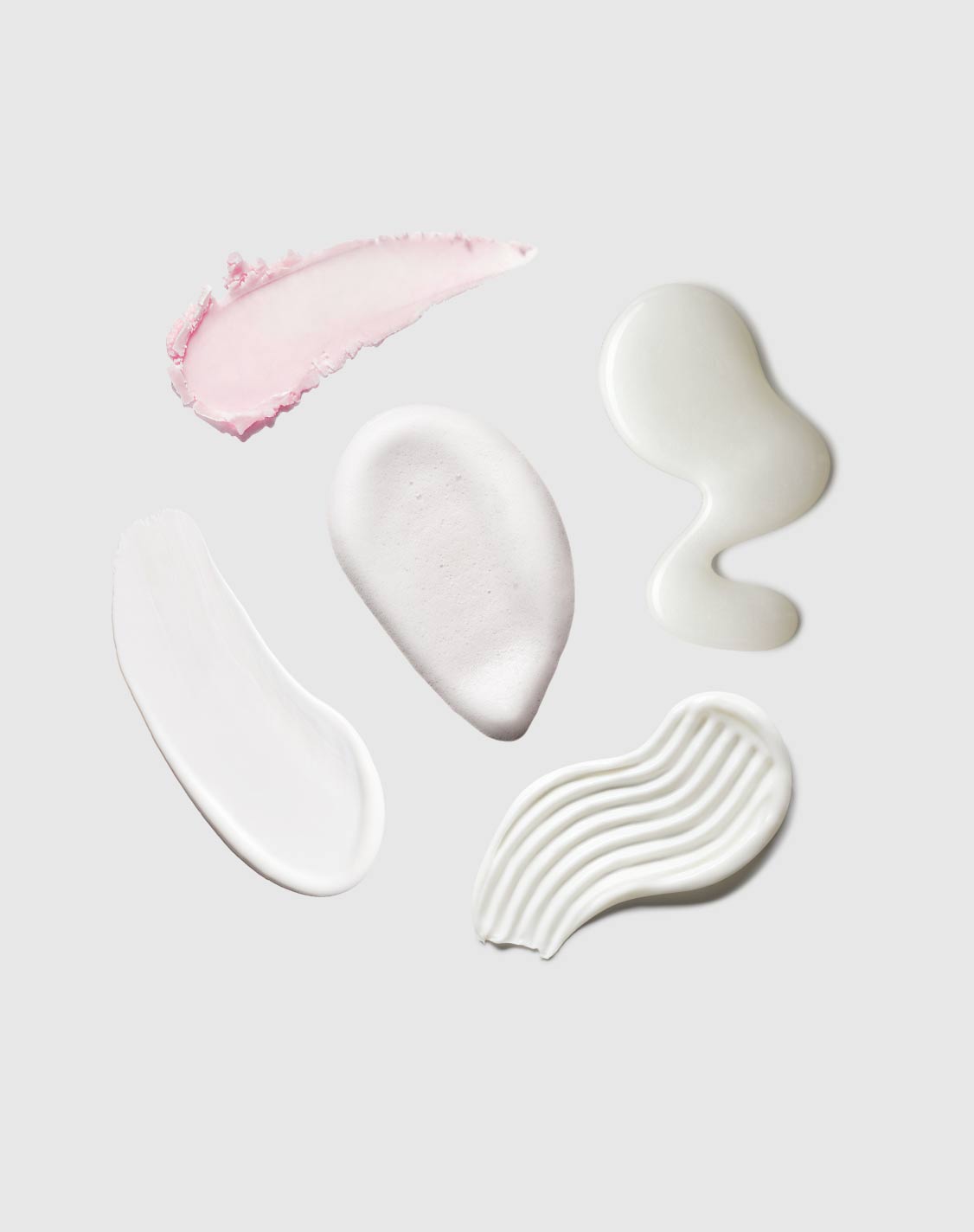 Texture of lip balm, face wash, face cream, shampoo, and conditioner. 