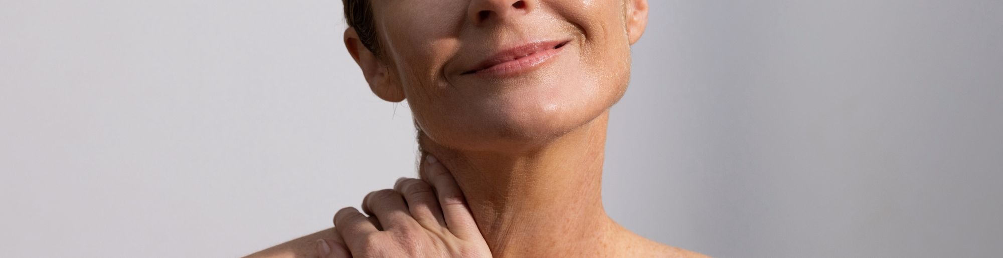 Skincare Model holding neck
