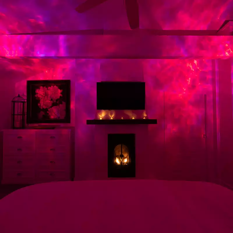 bedroom with red galaxy lamp