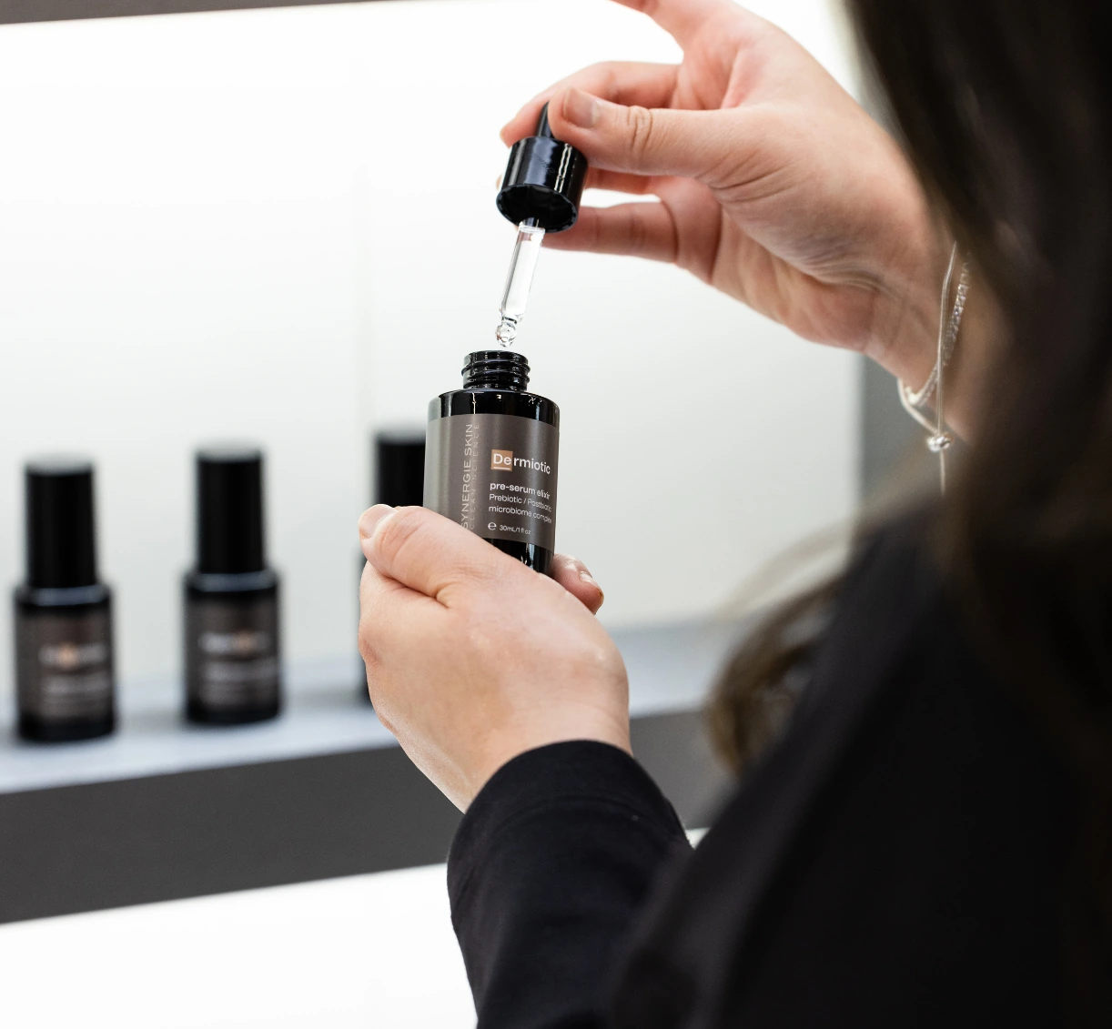 Customer holding Dermiotic