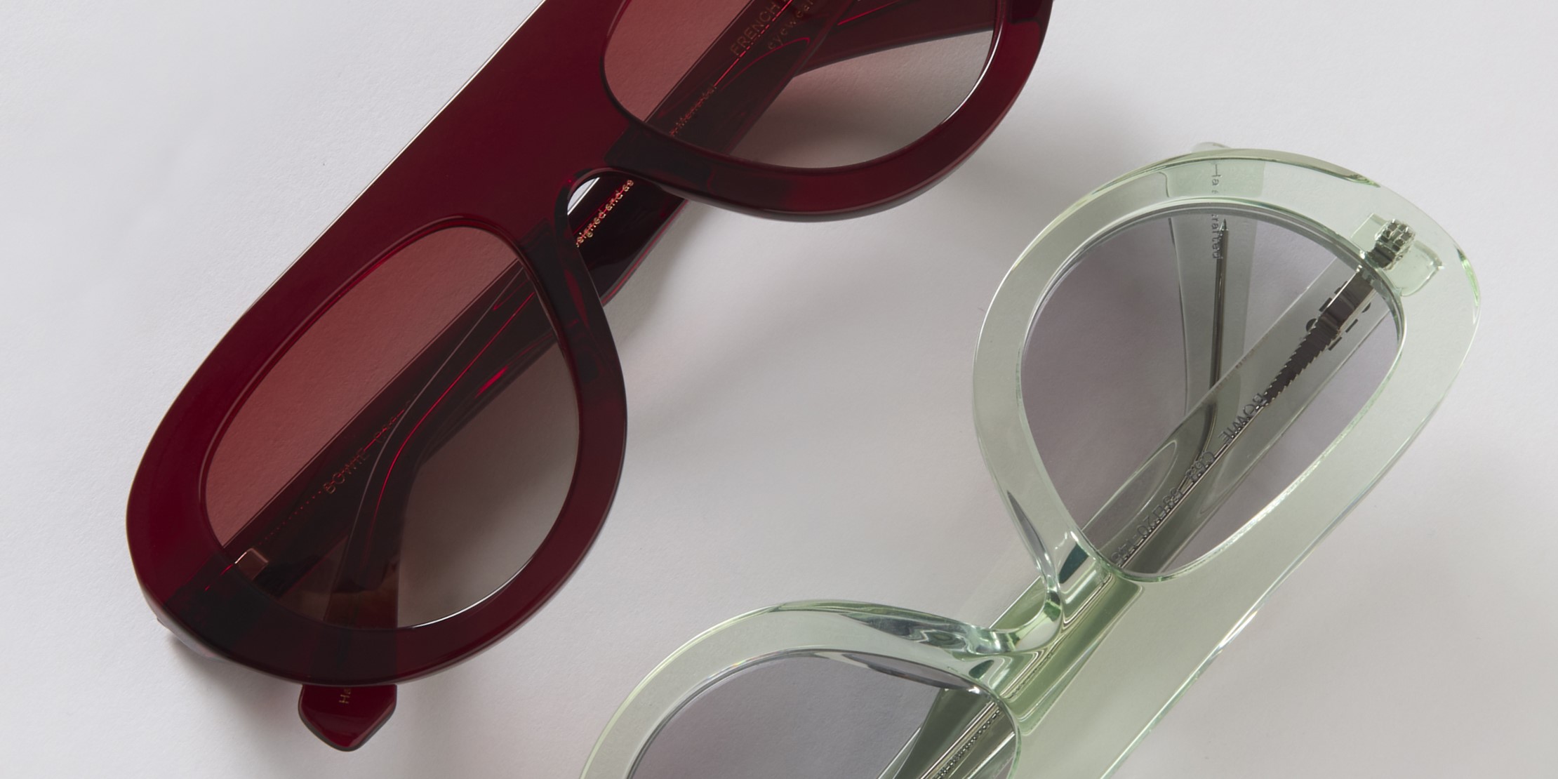 Photo Details of Bowie Sun Clear Taupe Sun Glasses in a room