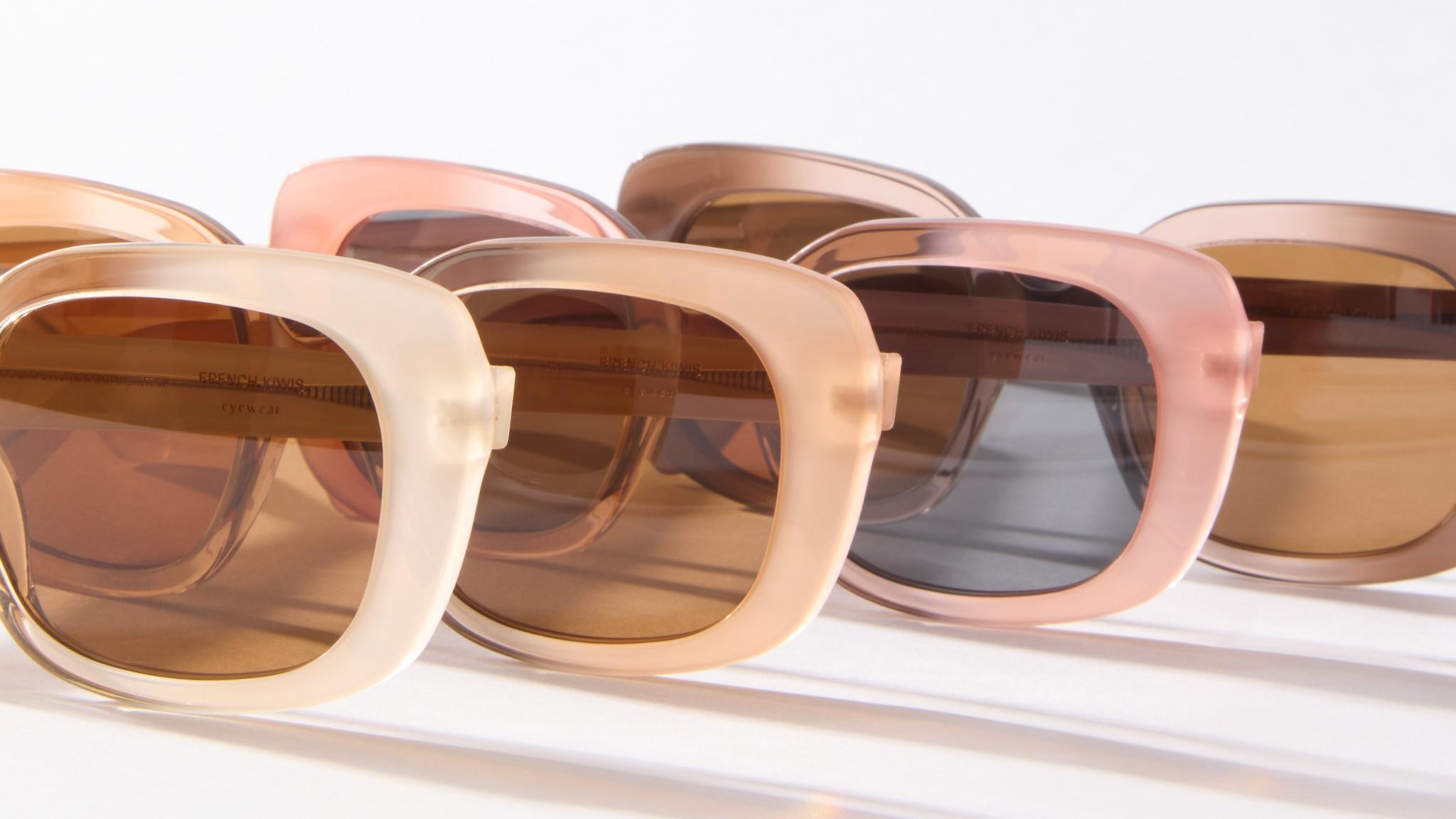 Photo Details of Celeste Sun Gradient Light Brown Sun Glasses in a room