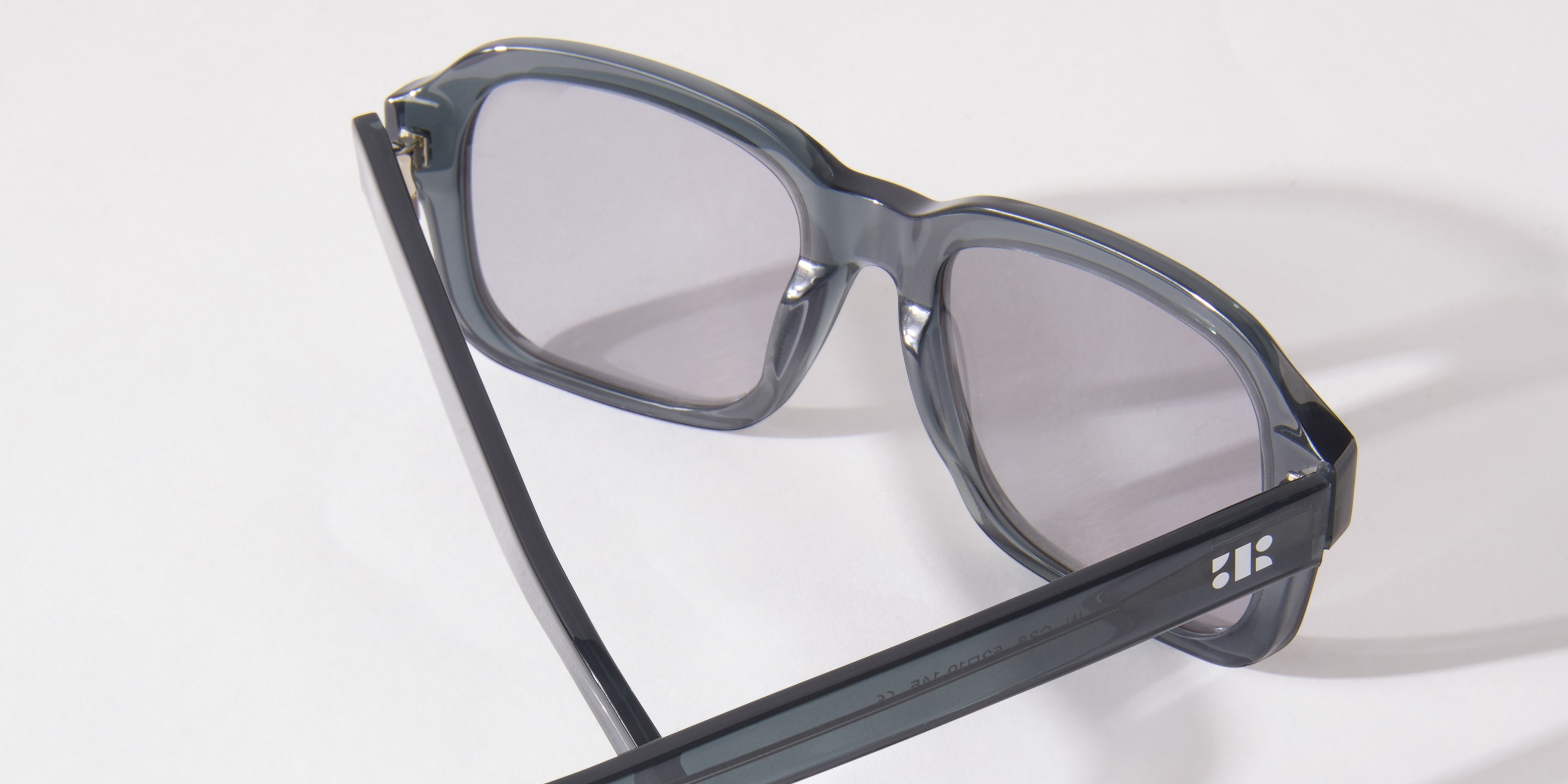 Photo Details of Colin Black Reading Glasses in a room