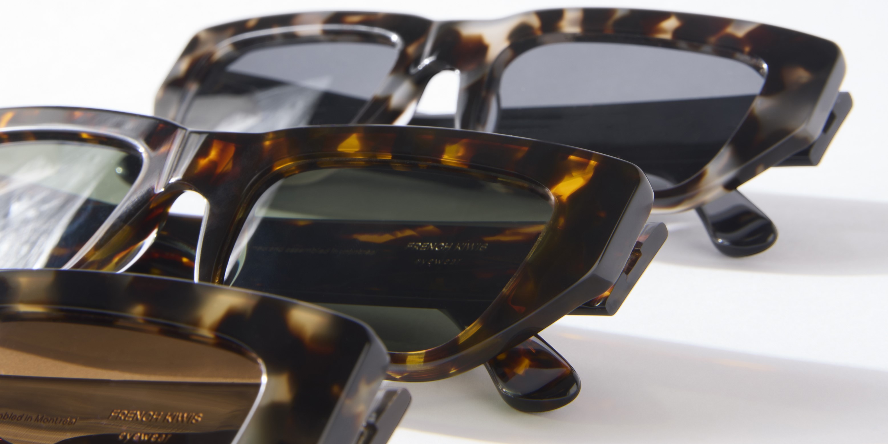 Photo Details of Kai Sun Multi Grey Marble Sun Glasses in a room