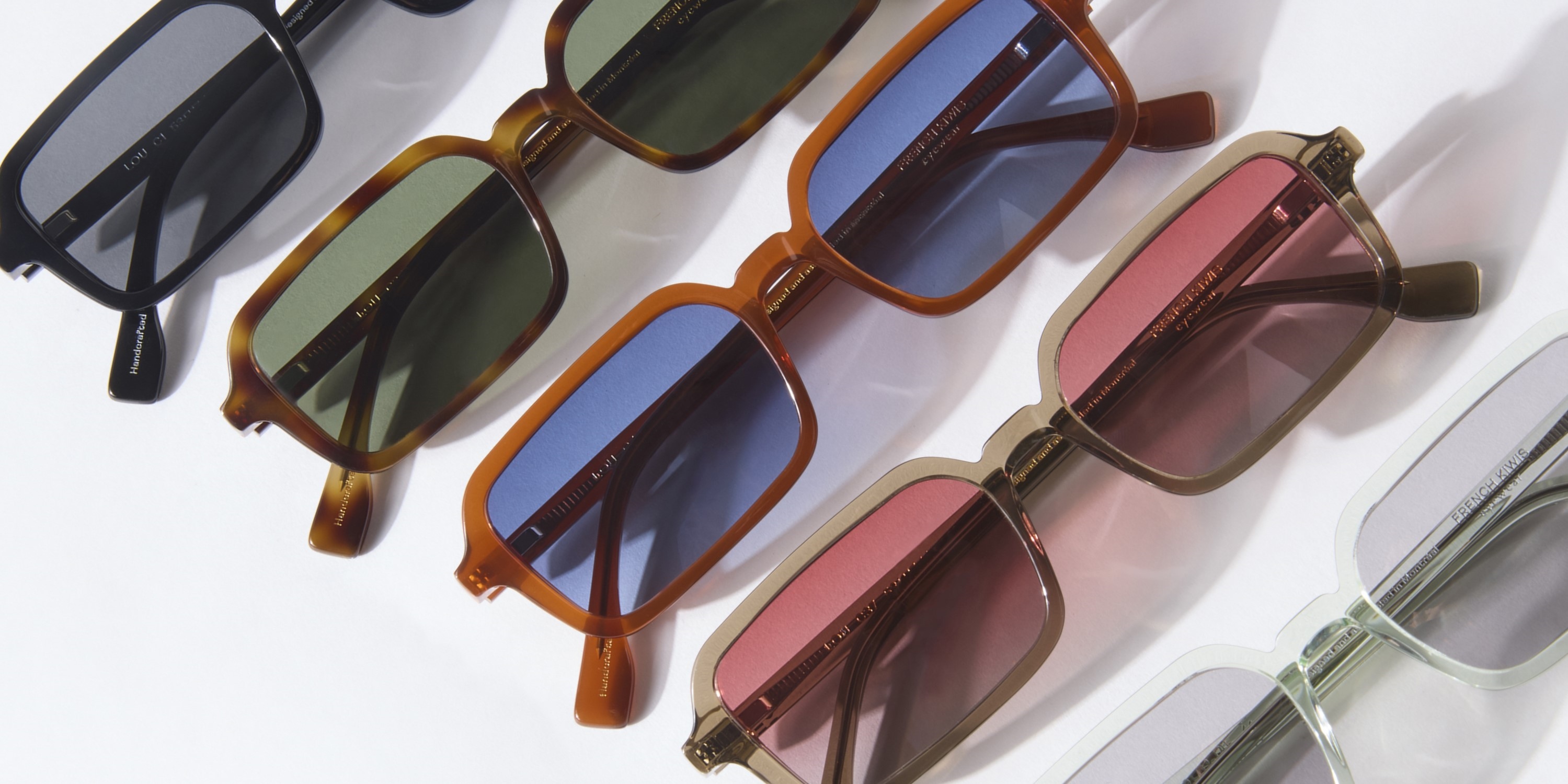 Photo Details of Lou Sun Clear Mint Sun Glasses in a room