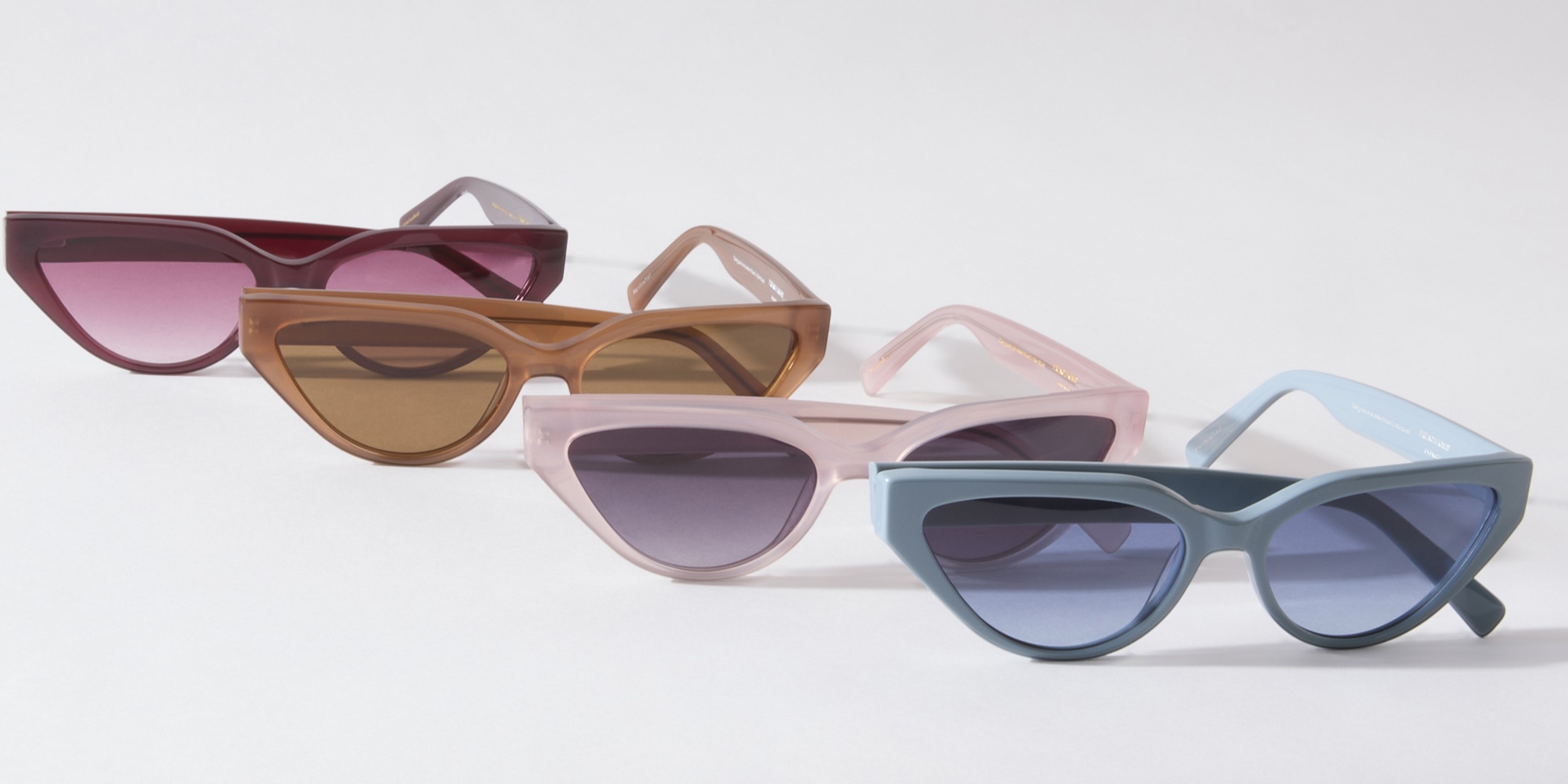 Photo Details of Nikki Sun Milky Amber Sun Glasses in a room