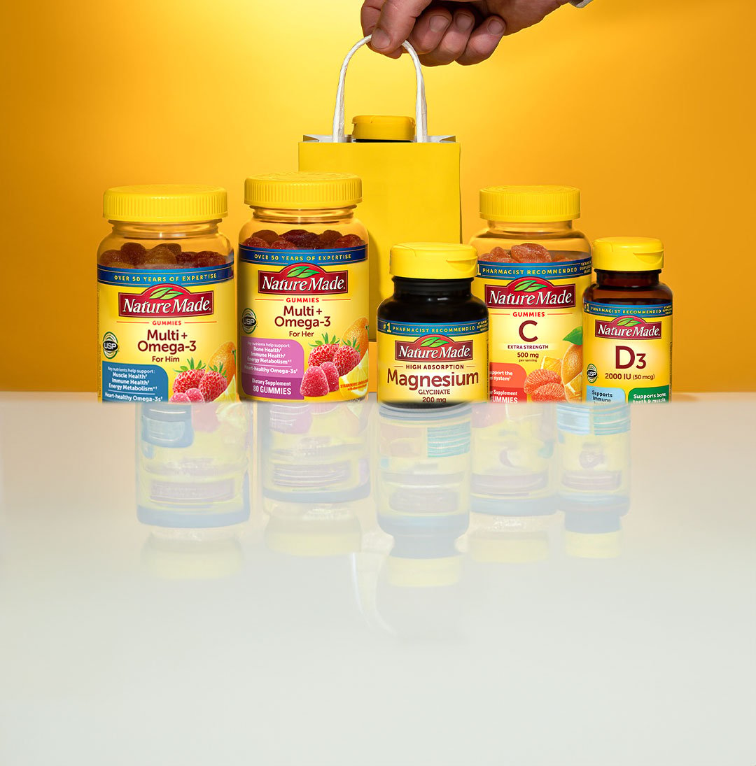 A variety of Nature Made vitamins and supplements, including gummies, tablets, and softgels.