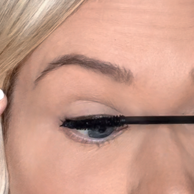 Press the wand at the base of your upper lash line
